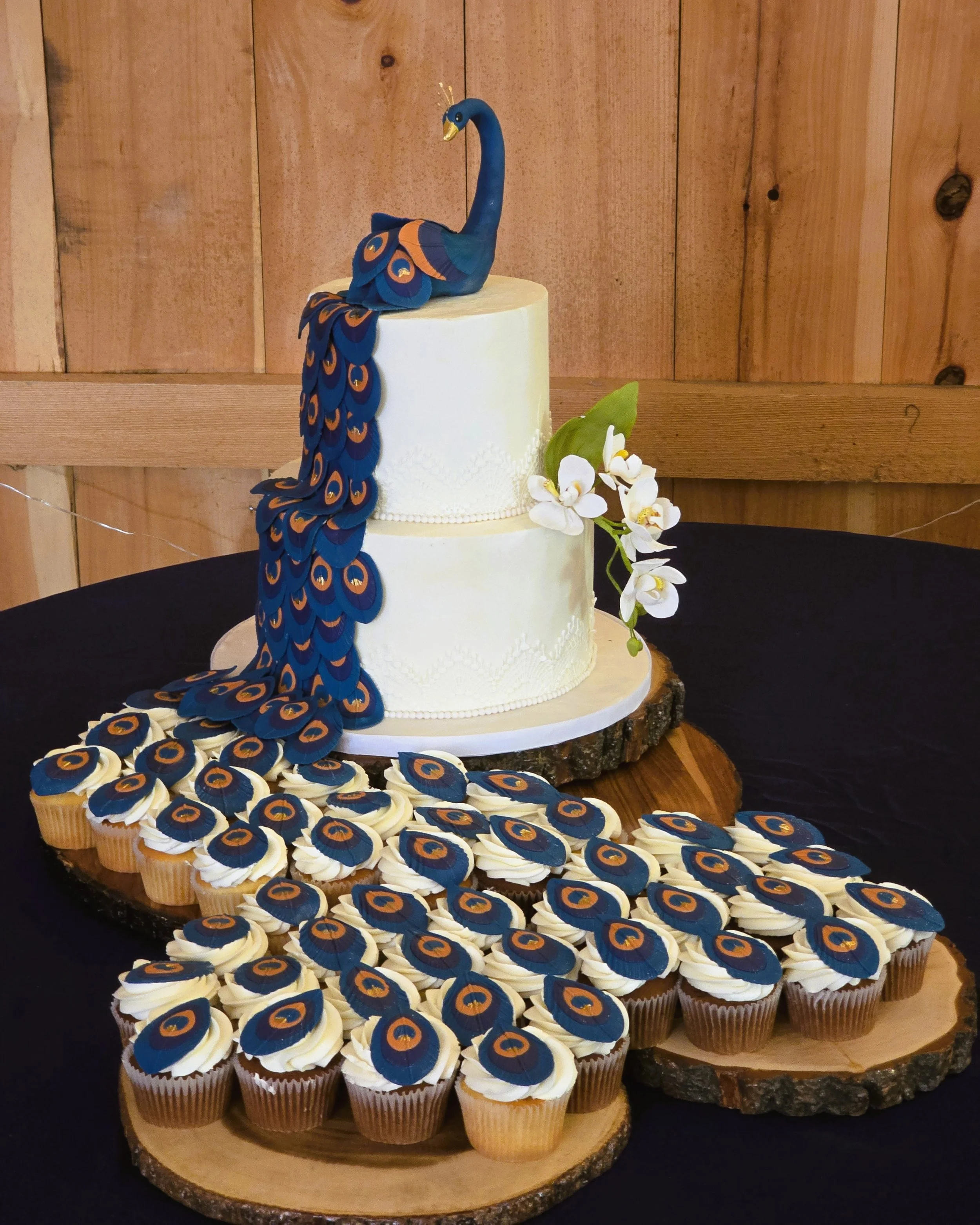 This was my dream of the peacock cascade of feathers over the cupcakes, and it worked!