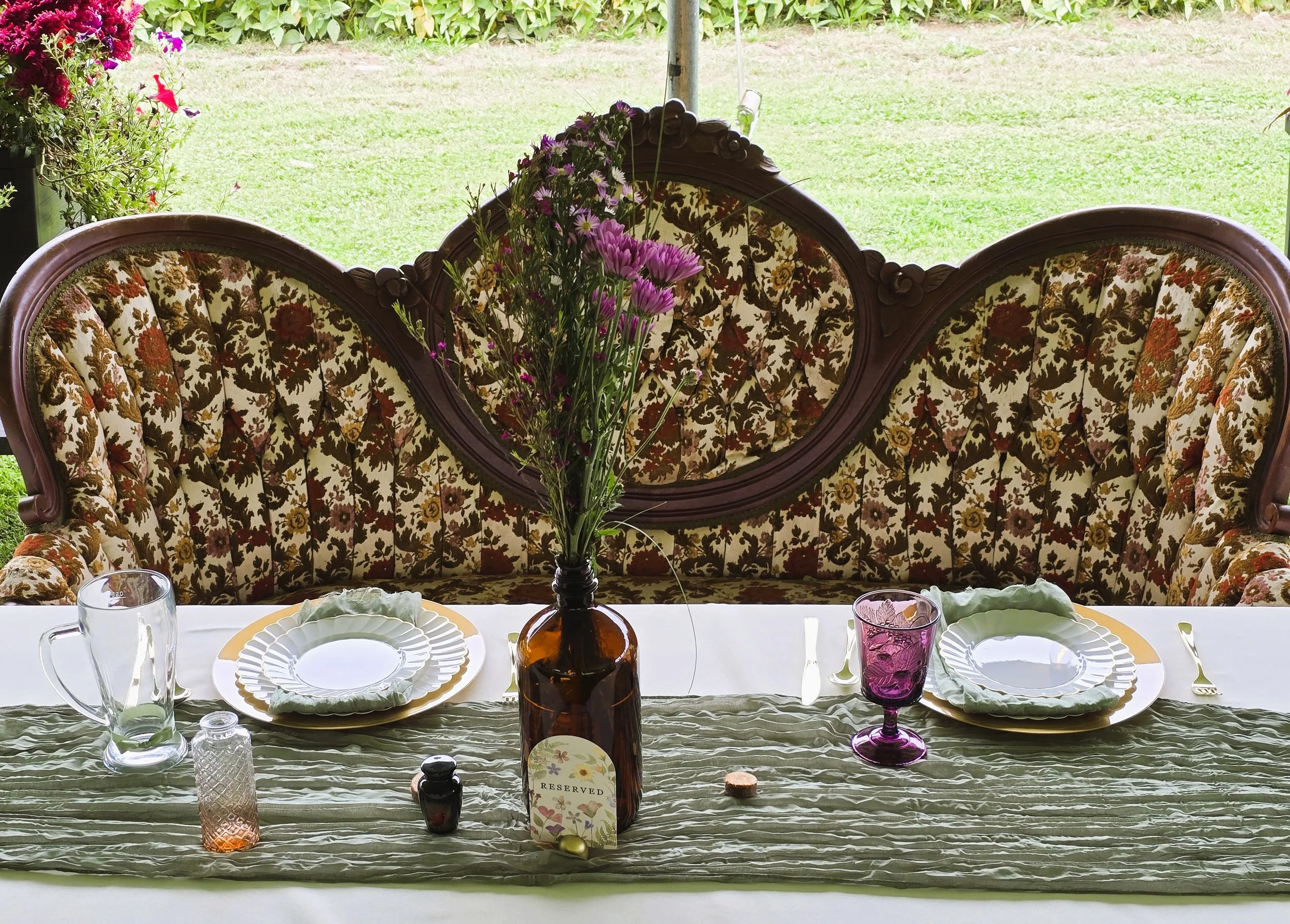 Wedding venue at private house Newlywed couple Loveseat Boho style.jpg