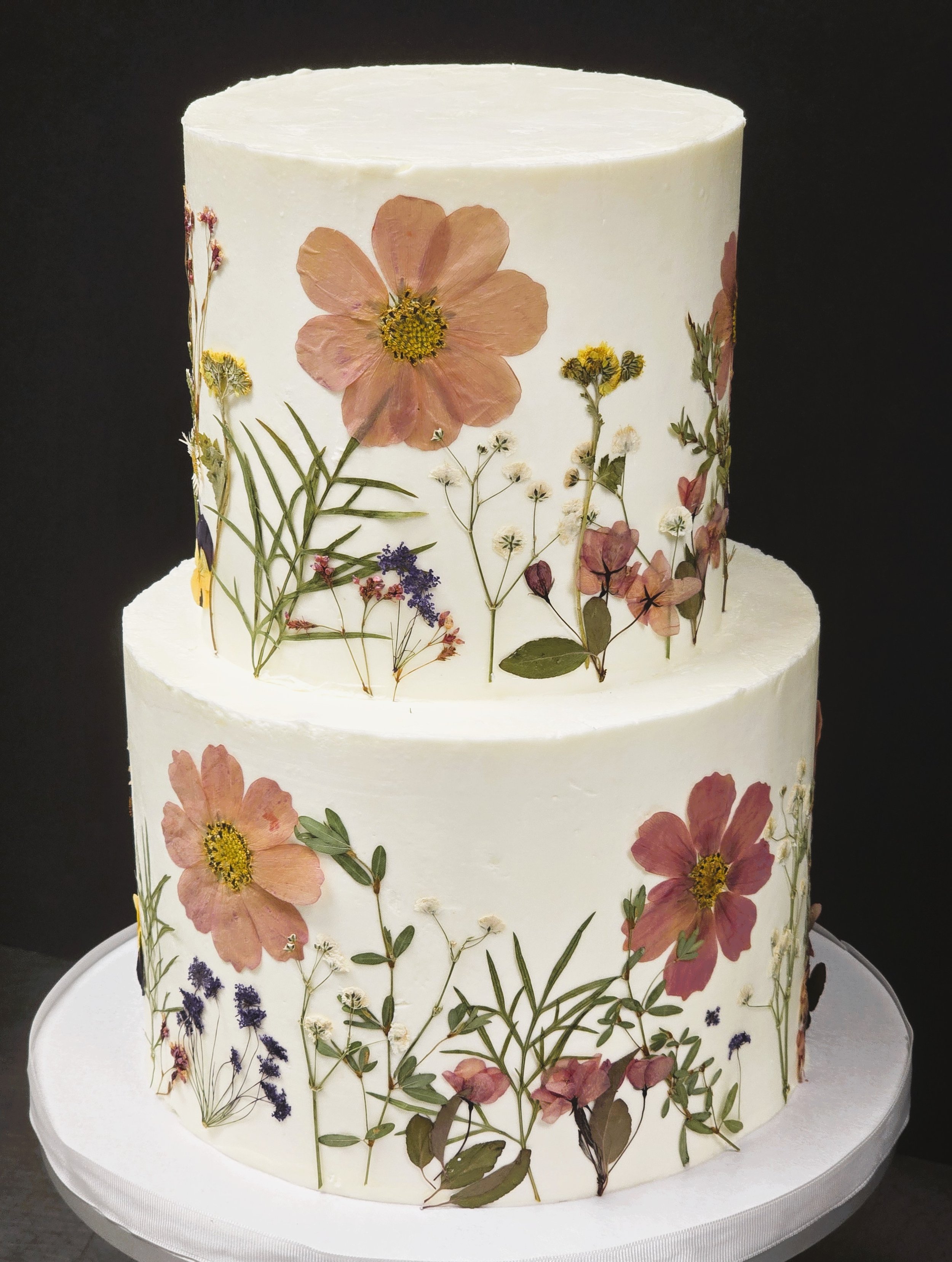 Wedding cake buttercream natural pressed flowers Boho style.jpg