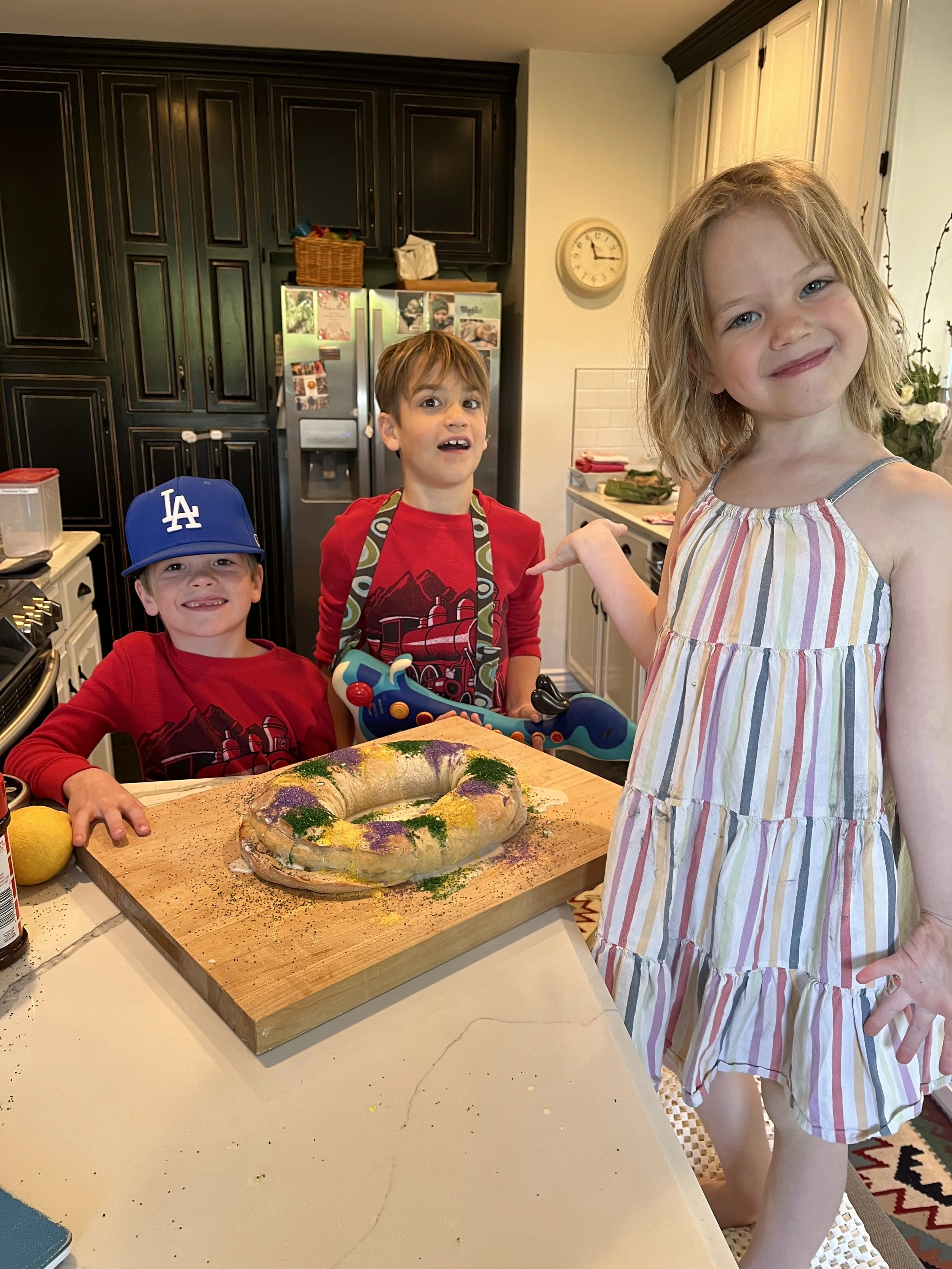 King Cake with 3 kids.jpeg