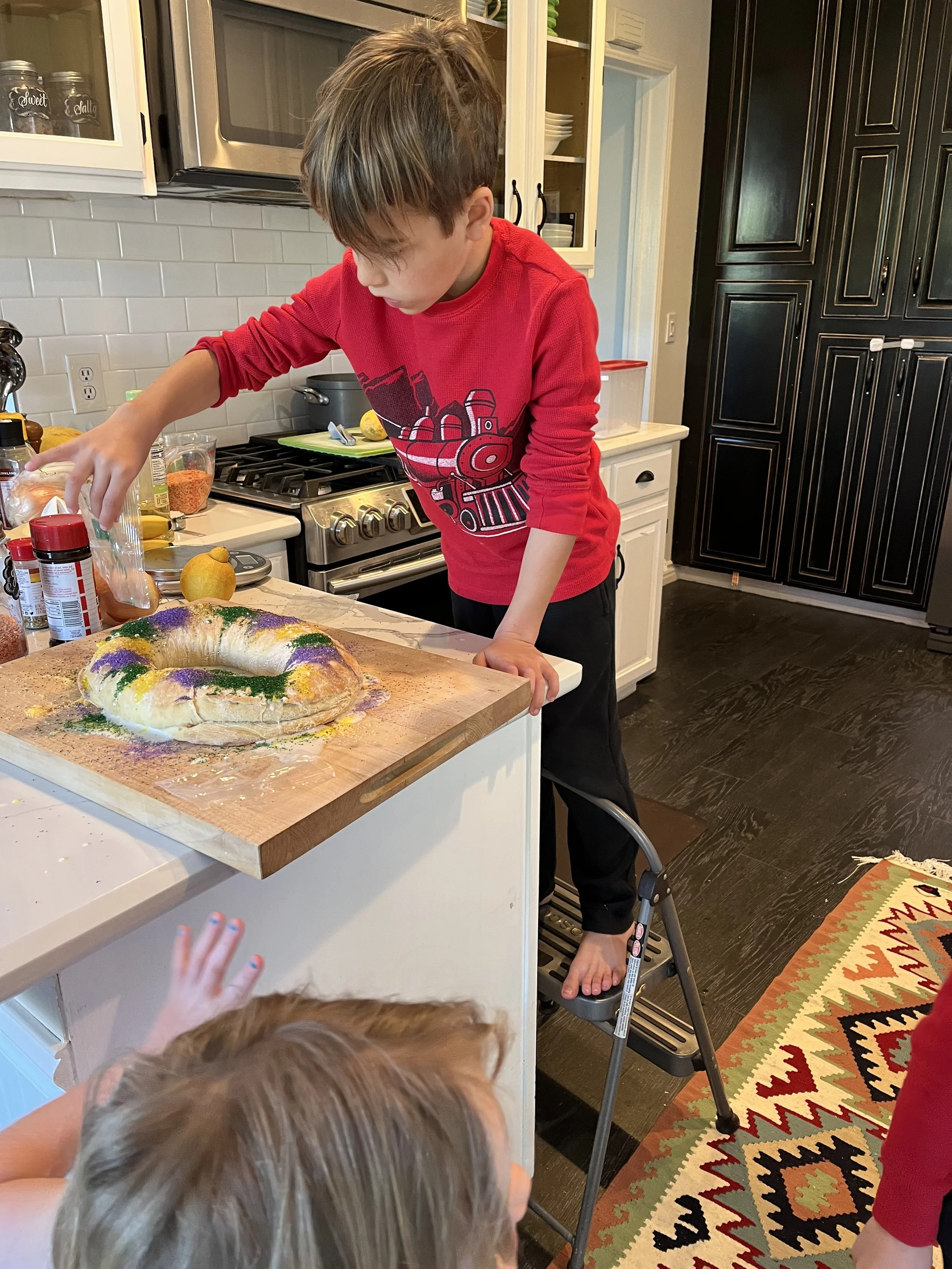 King Cake with kids Jett.jpeg