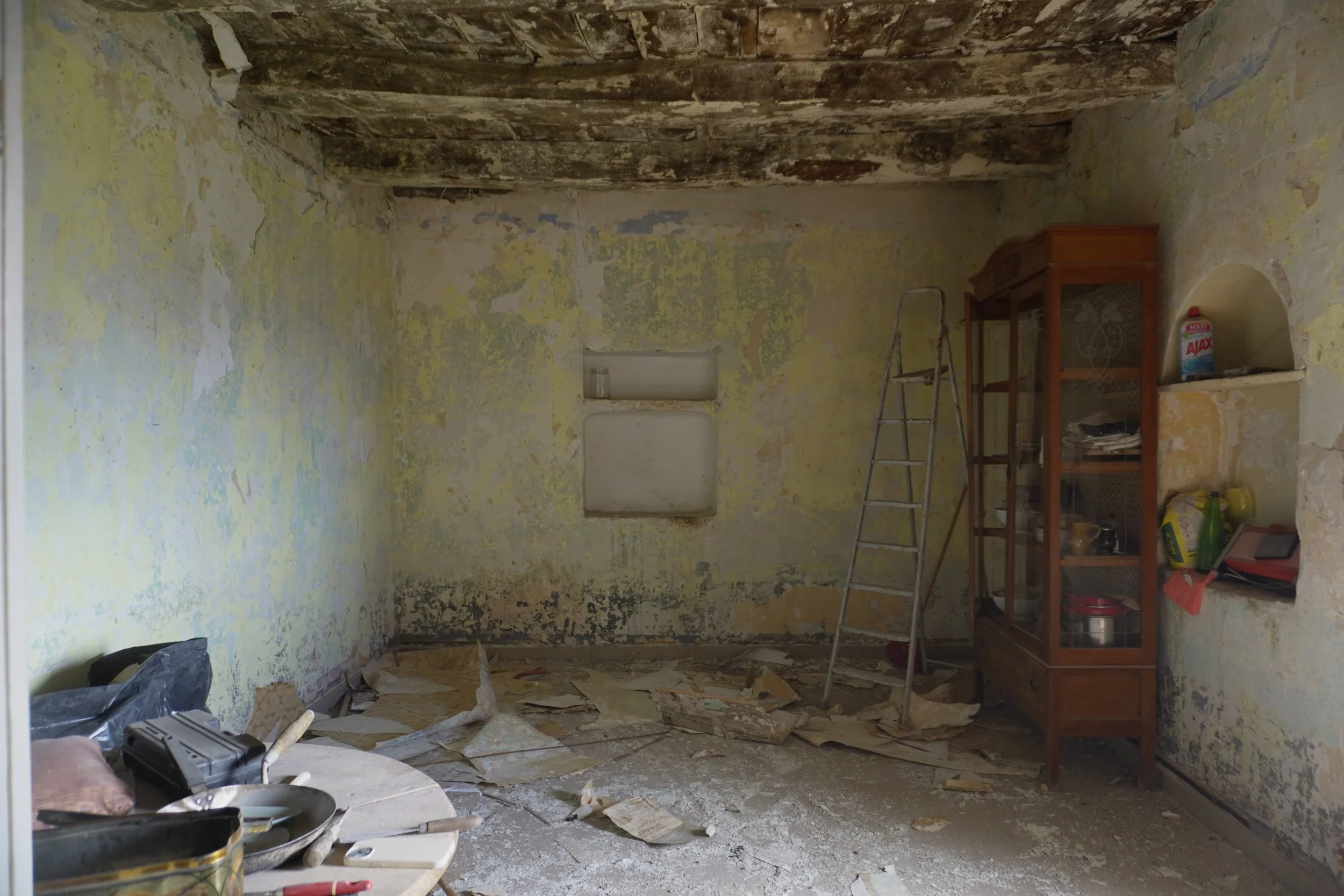 Medieval beams and stone walls being restored at Casa Bondi, Campania