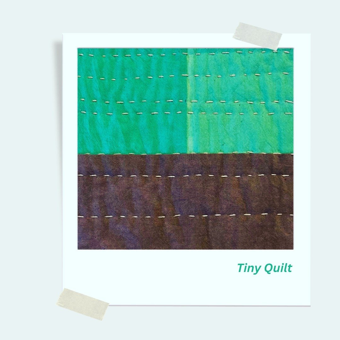 What make a quilt?
A quilt typically is composed of 3 layers -- quilt-top, batting, and backing. Here are 3 small pieces of hand-dyed fabric sewn together to create a tiny quilt-top, then put on top of a piece of backing fabric with a piece of battin