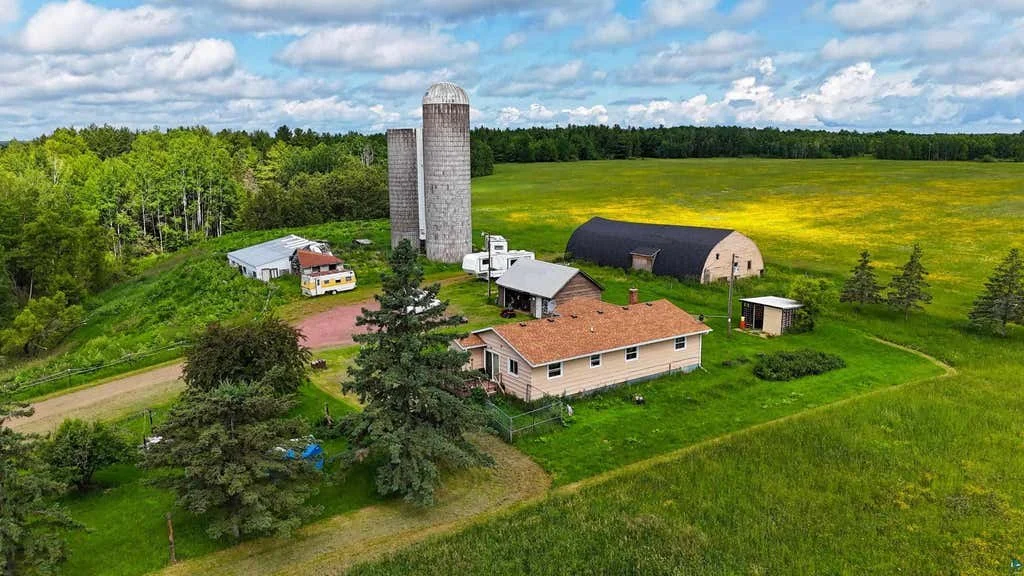 Enjoy peaceful country living just 15 minutes from Ashland and Lake Superior. This nicely remodeled ranch sits on 10 open acres and offers about 1,950 sq ft of living space with updated flooring and a new bathtub in the full bath. The bright kitchen 