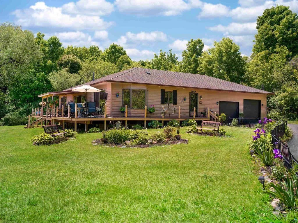 One of the premier locations in Bayfield, this beautifully designed ranch-style home is tucked away at the end of a quiet cul-de-sac for ultimate privacy. Just a 2-minute walk from everything downtown Bayfield has to offer - and yet completely privat