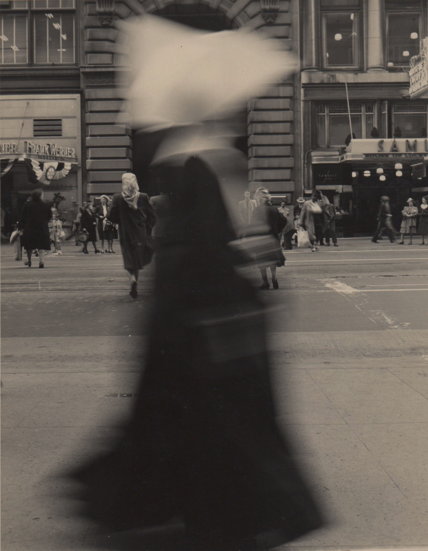 Woman in Motion on a Busy Street, San Francisco, 1945.