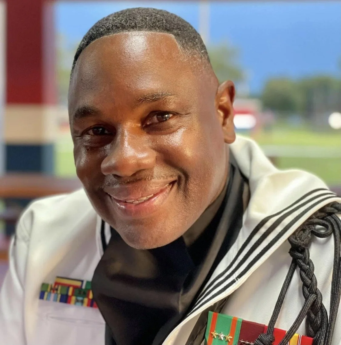 Navy Bio Photo Wht.jpg