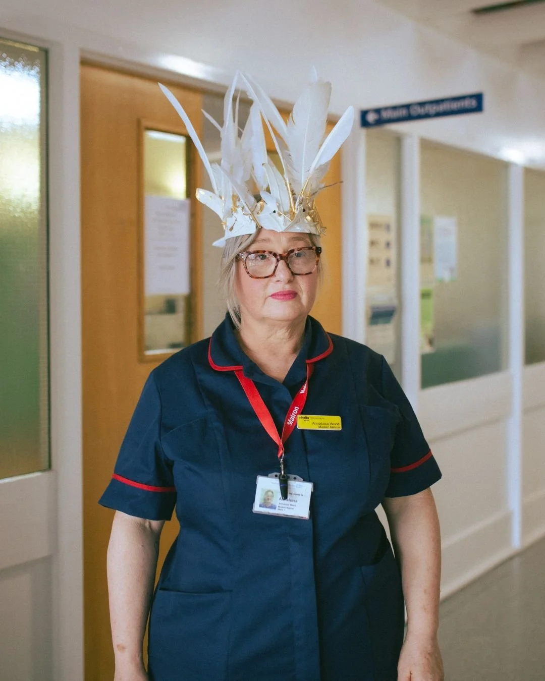 Annaluisa Wood, Modern Matron at Berwick Infirmary, wearing a crown by Deborah Boyd-Whyte