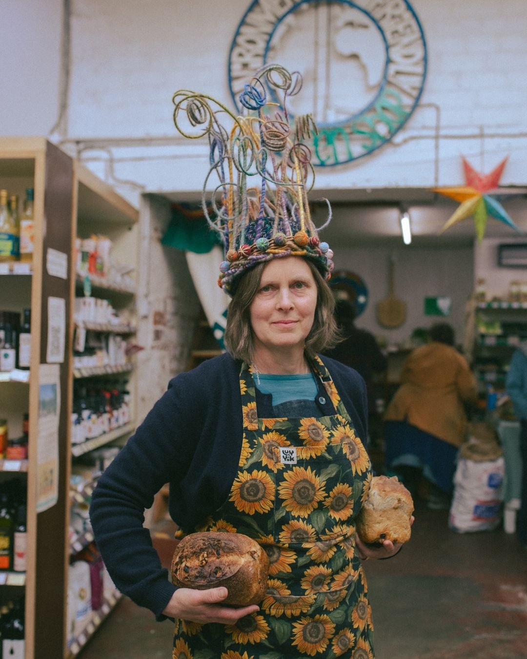 Roz Haddrill—proprietor of the Green Shop—wearing a crown by Jennie Howes