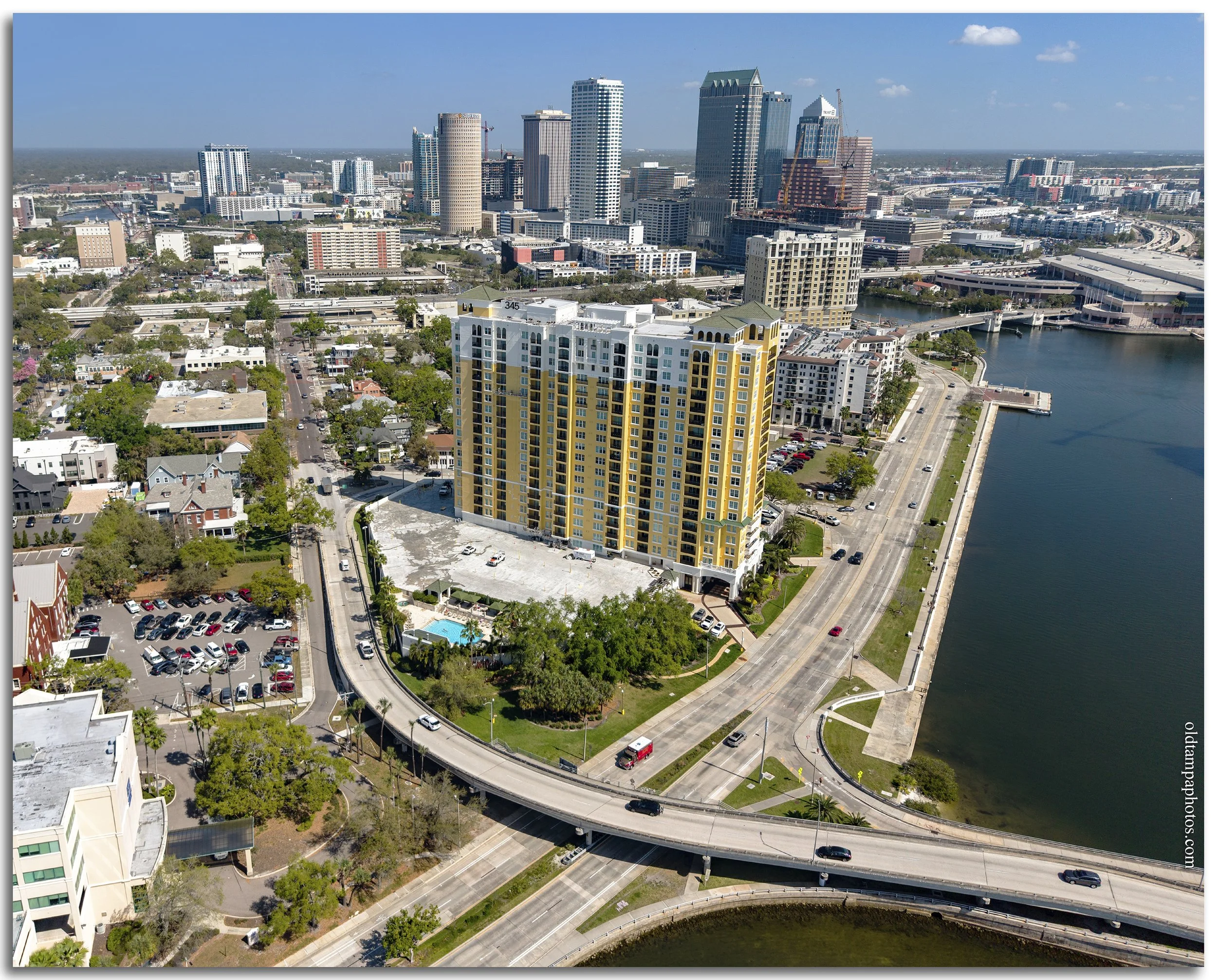 Historic comparison of DeLeon Street and Bayshore Boulevard in Tampa, showing the former mansions and today's 345 Bayshore condominium tower near the Davis Islands Bridge.