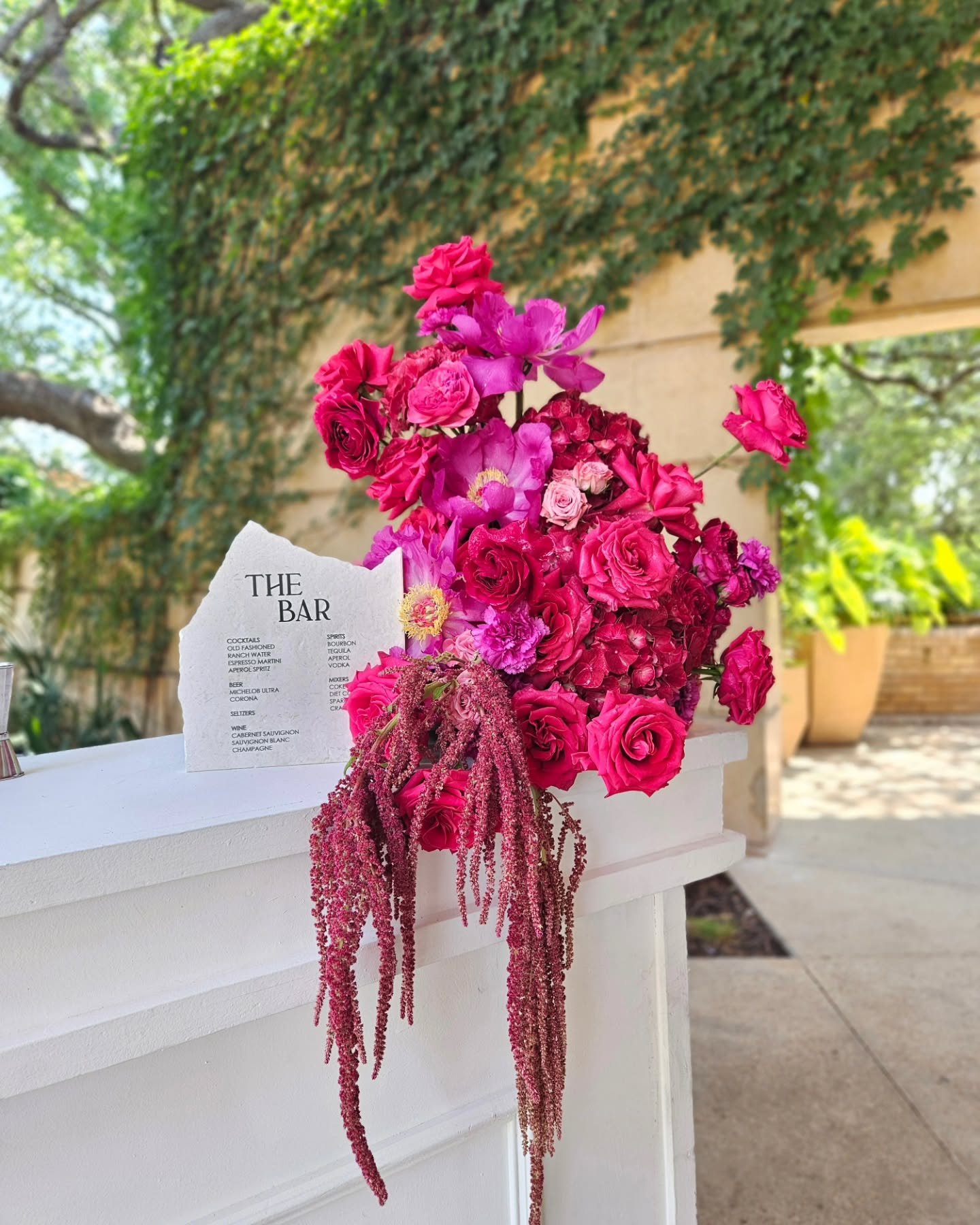 The stars of the show: lush, vibrant pink peonies! 🌸 A bar arrangement designed to turn heads and make memories.

#peonyseason #barflorals #weddingreceptiondecor
#weddingreception #floraldesign #weddingflorals #weddingflorist #yarrowandjames