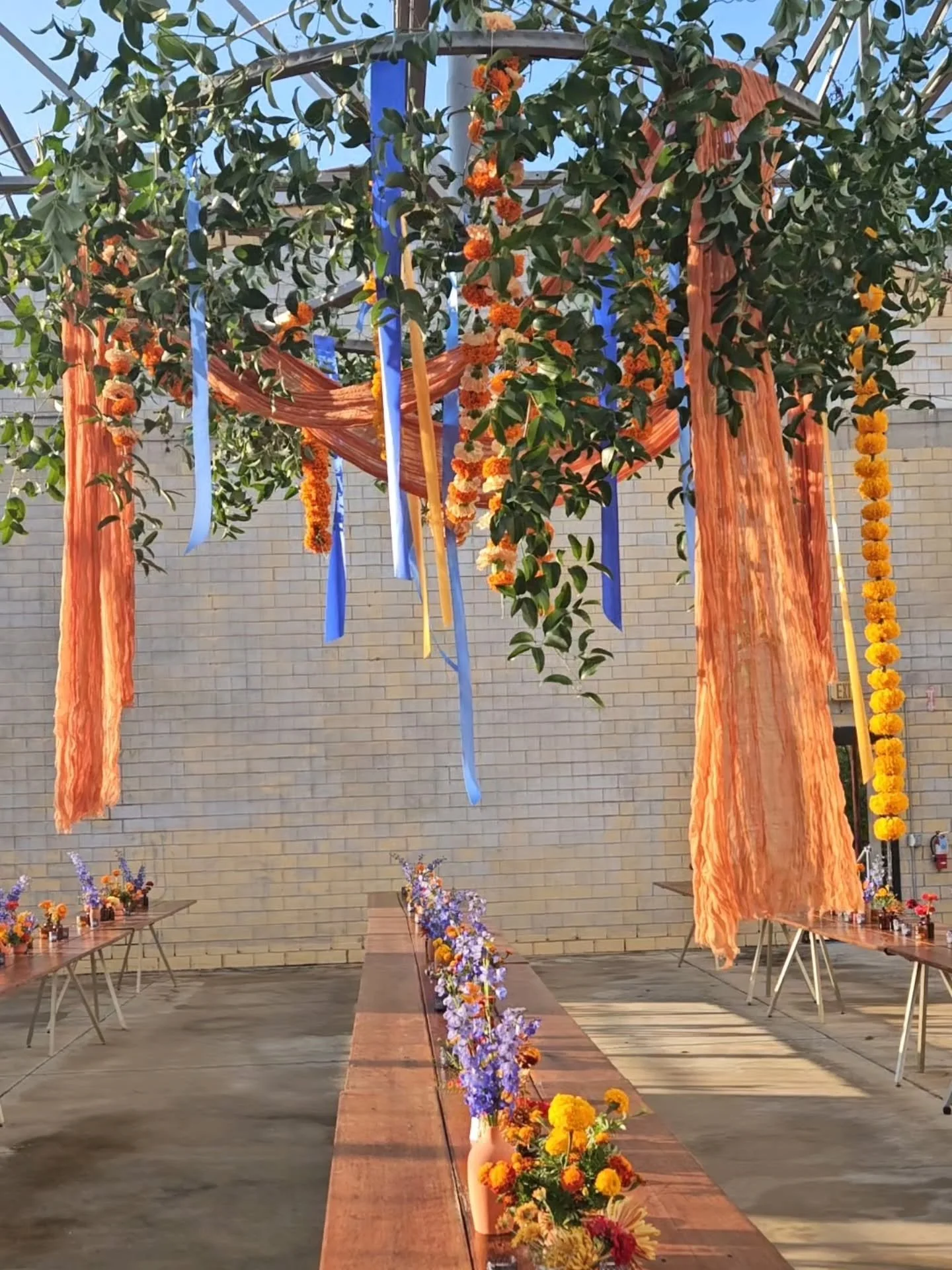 Intentional designing doesn&rsquo;t always have a recipe...

I started with a vision for this moment &mdash; green textures, marigold garlands, and layered textiles&mdash;and let the design grow from there. Together, they created an unforgettable sta