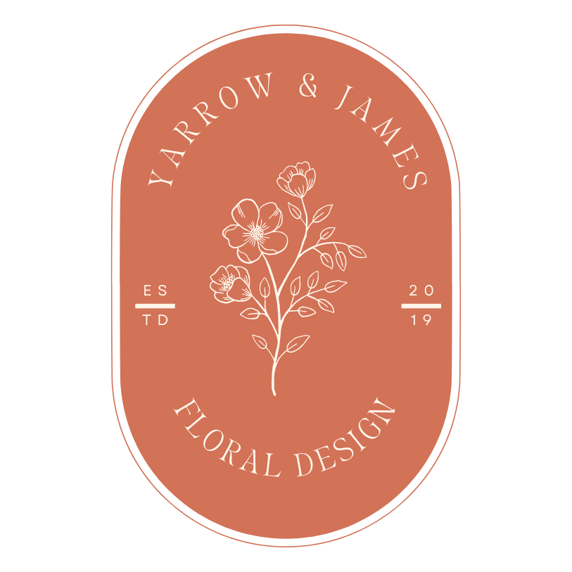 A logo featuring an oval shape with a terracotta background. Inside, there's a line drawing of a flowering plant with three blossoms and several leaves. The text "Yarrow & James" is curved along the top, and "Floral Design" is curved along the bottom. On either side of the plant, there are bars with "ESTD" on the left and "2019" on the right.