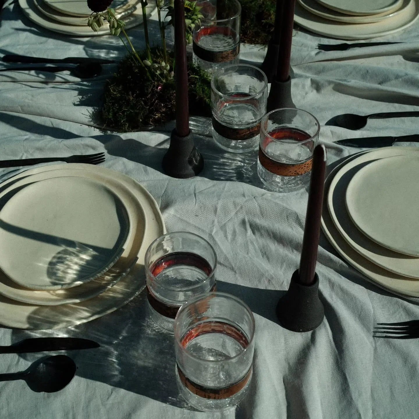 The table, as art.

When each piece carries its own weight,

You need less.

Every piece has movement- each shaped by hand, each holding distinction. Cups, cutlery, plates, candle holders.

There is no matching here- only composition.

An exercise in