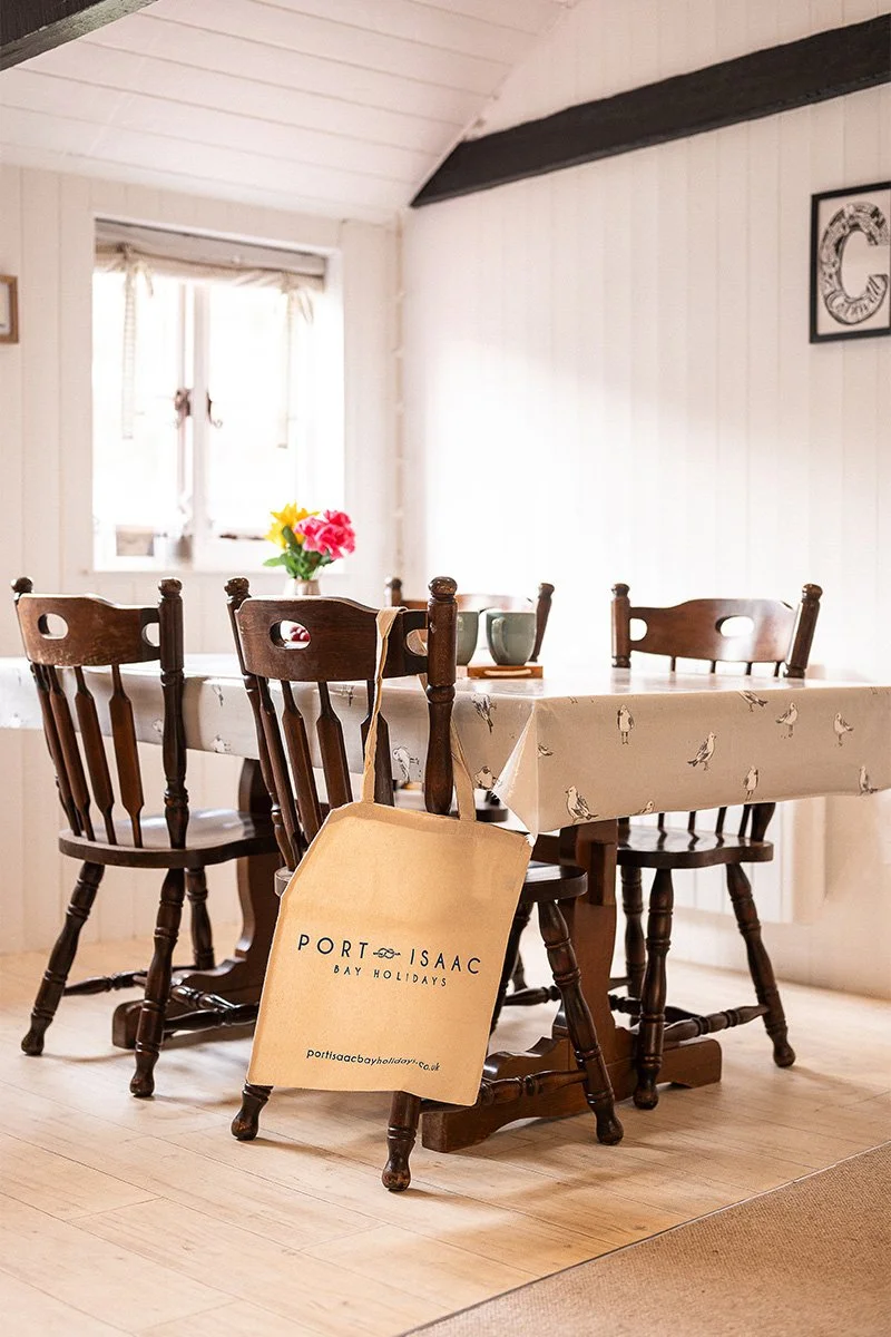 dining table at portcor apartment in port gaverne