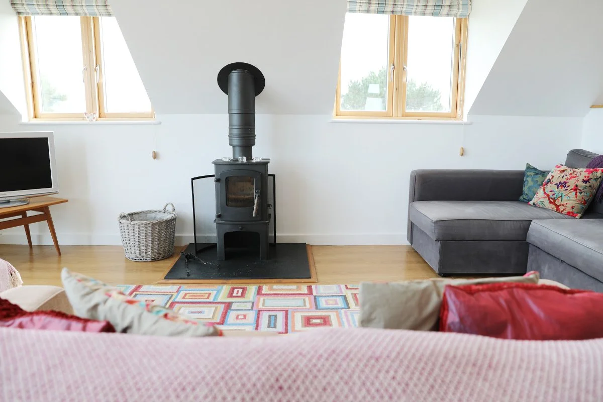 wood burner in north light holiday let in port Isaac