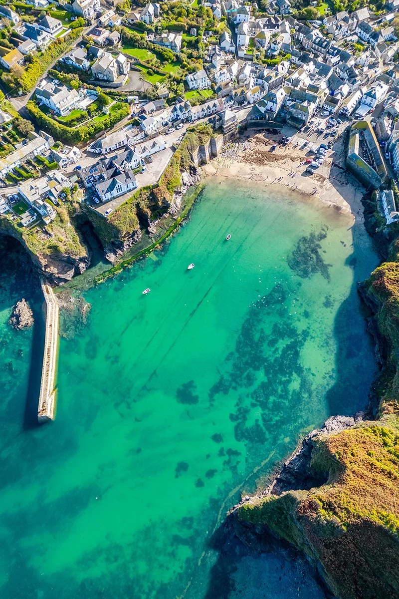 aerial view of port isaac harbour, cornwall, on a summer's day