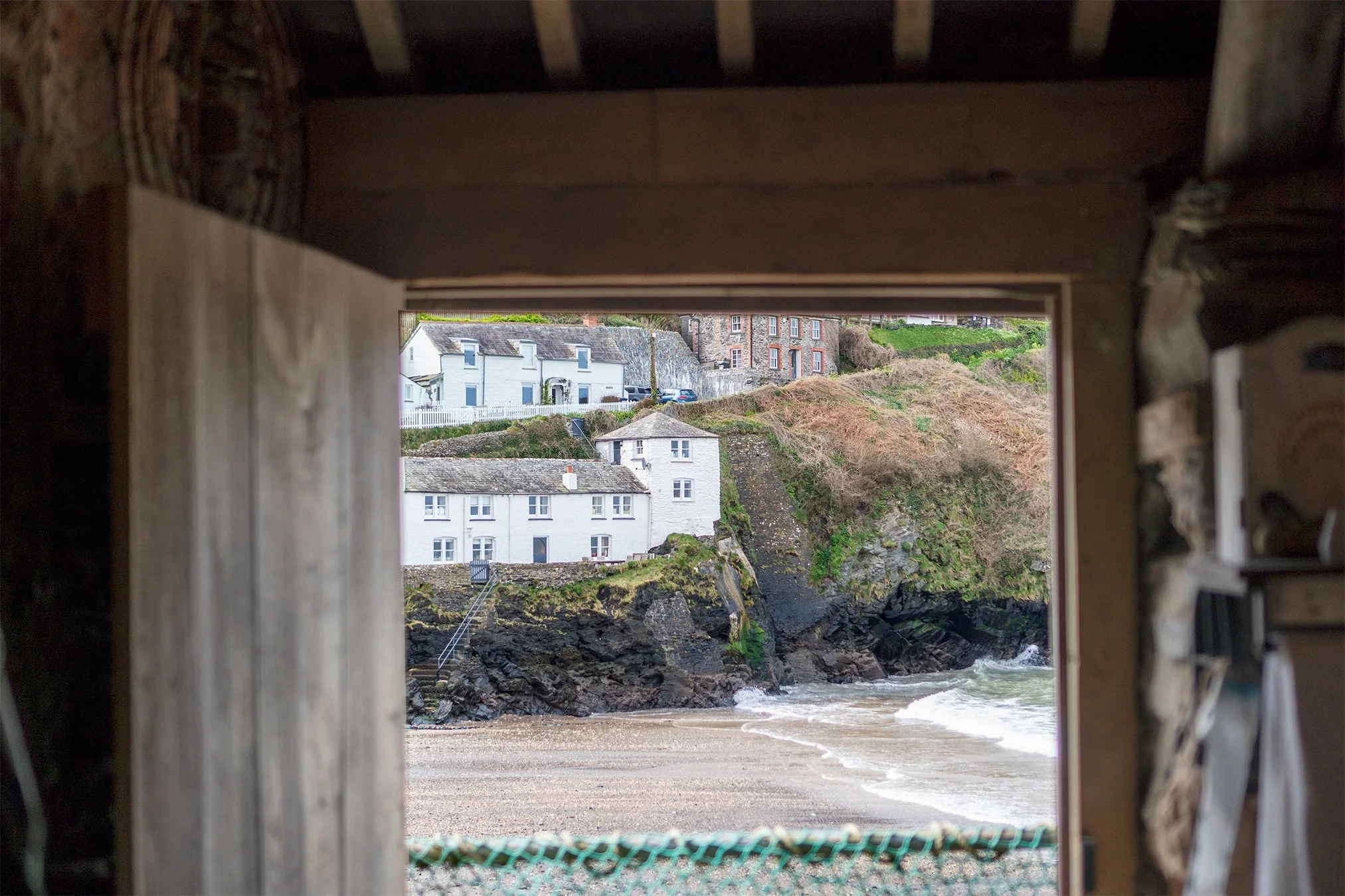 view of roscarrock hill from pilchard press studio in port isaac