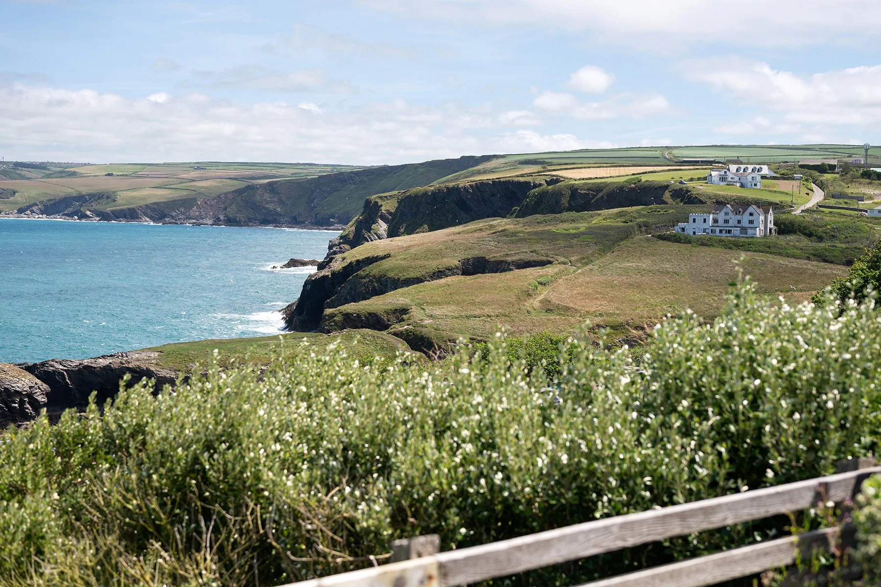 view across Port Gaverne and Port Isaac bay from sea gems
