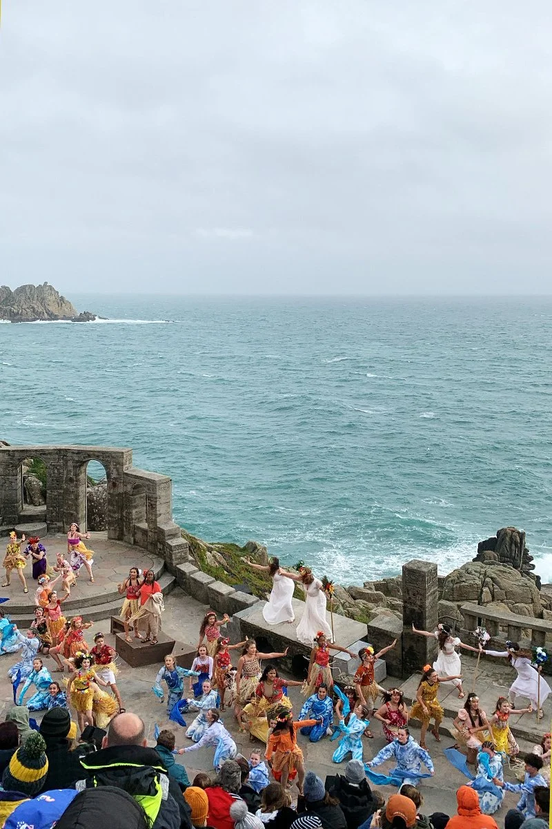 theatre performance on a grey day at the minack theatre