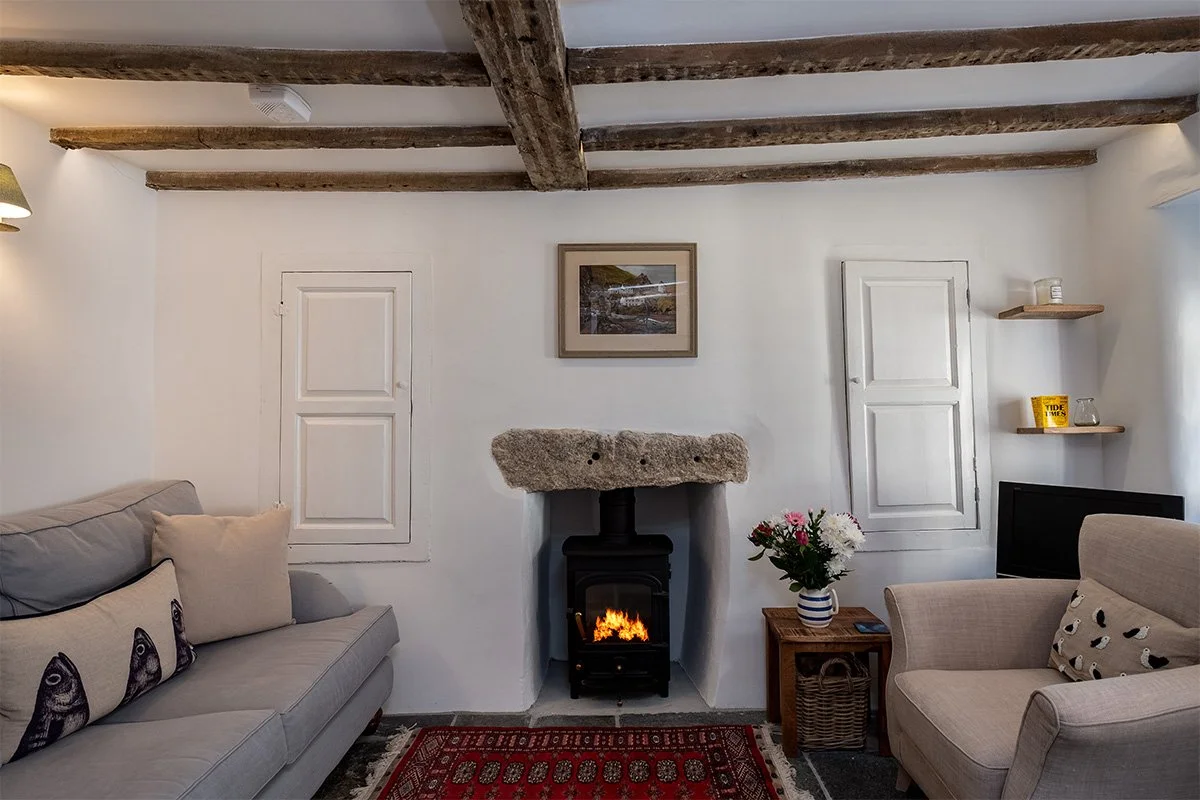 wood burner in the living room at mobray in port Isaac