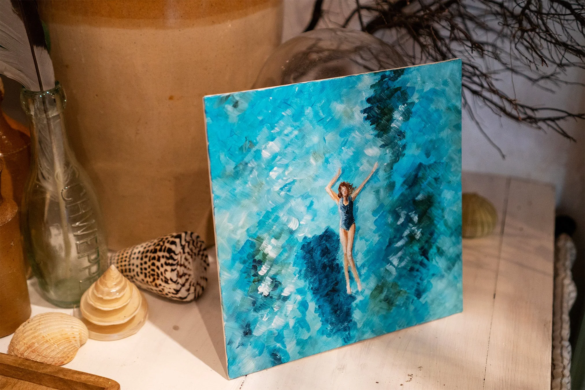 aerial painting of a swimmer, by artist stacey sibley