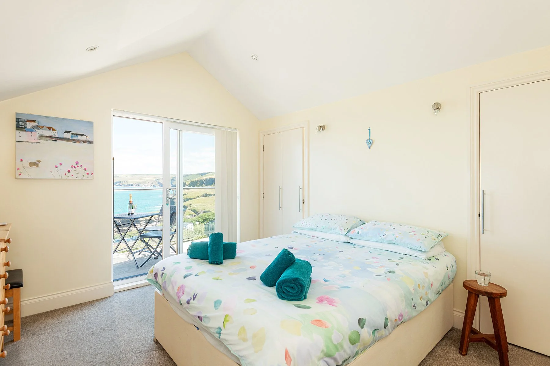 master bedroom at sea gems with a view over port isaac bay out the window
