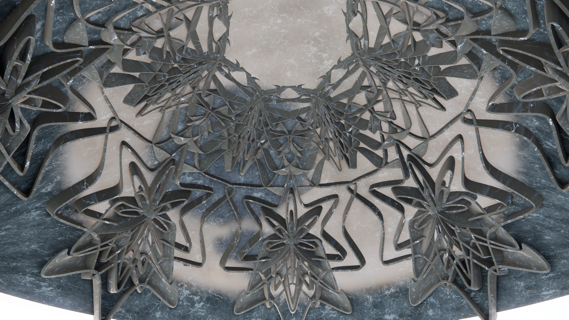 Close-up of dark gray metal butterfly-shaped ornaments with a black background and marble-like gray pattern