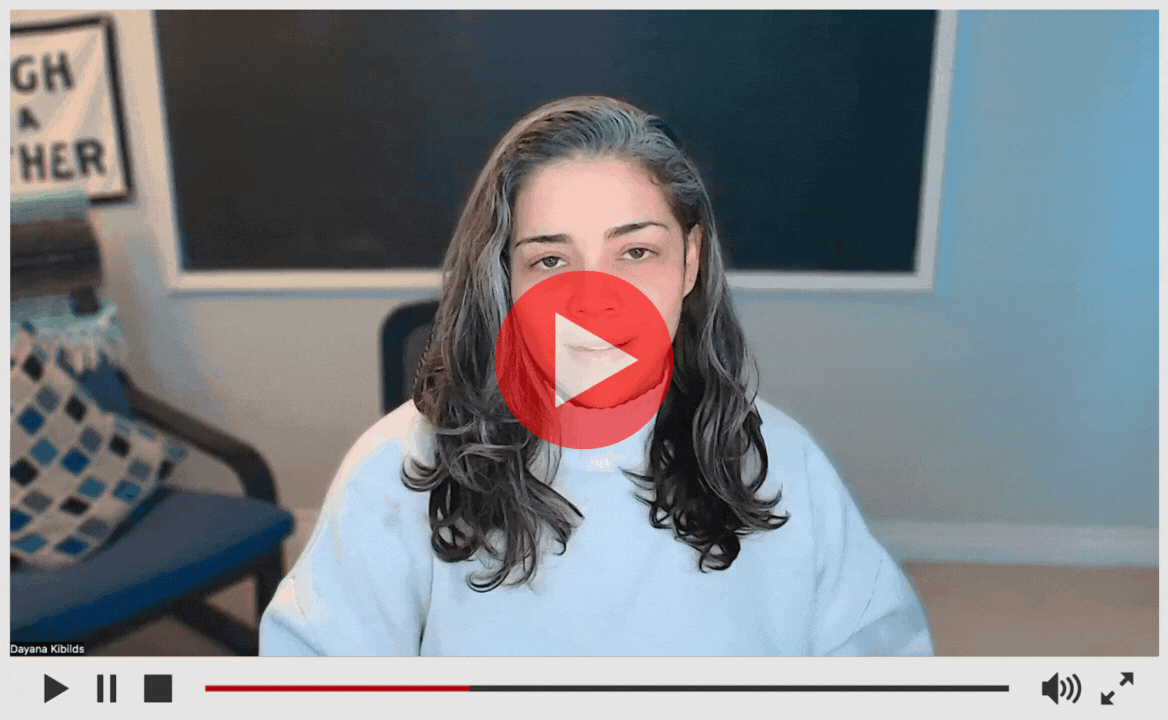 A video snippet of Day speaking directly at the camera, with a play button in the center, implying this is a video to be played.