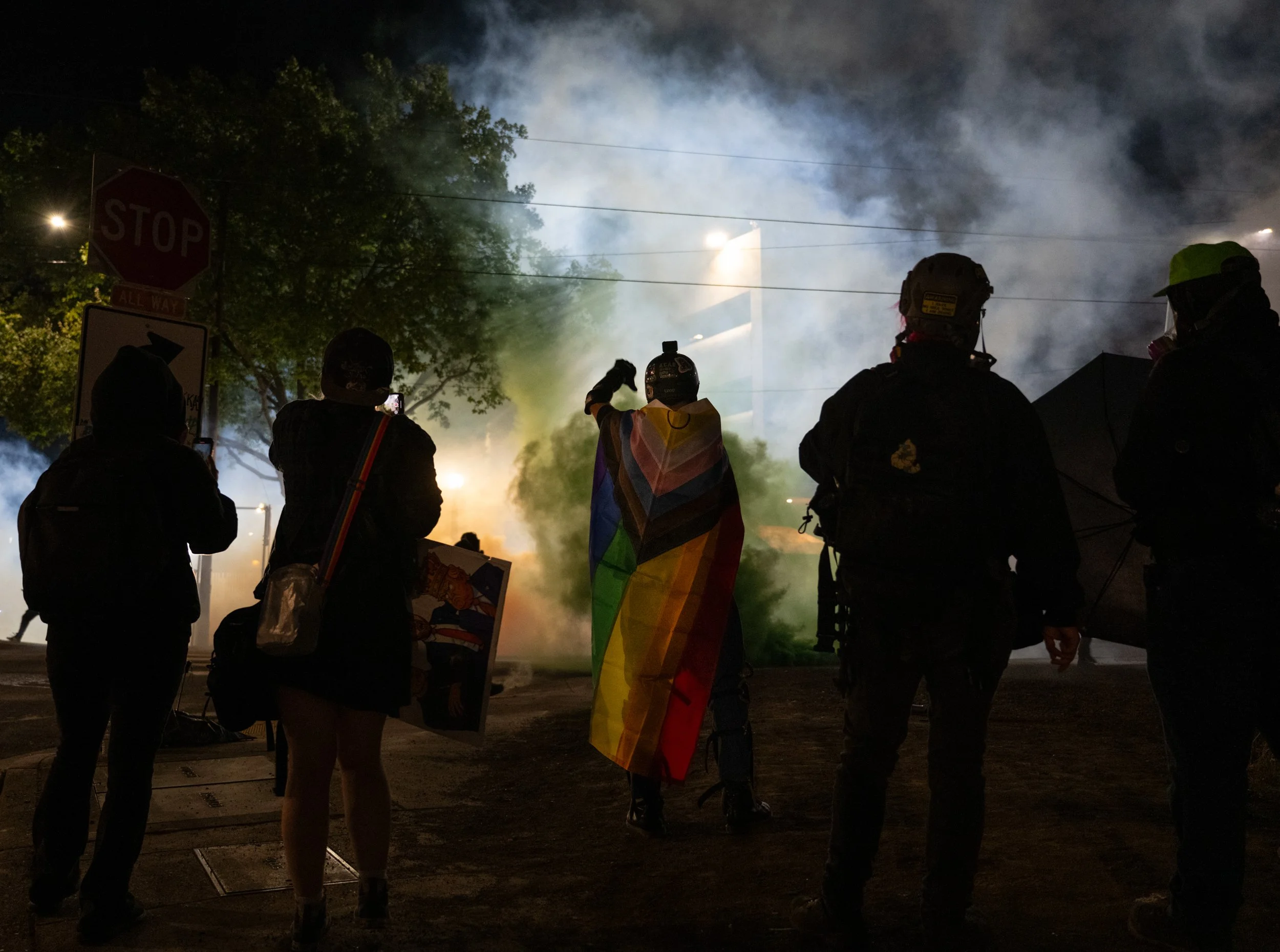  Protestors demonstrate at the U.S. Immigration and Customs Enforcement (I.C.E.) offices on Saturday, Aug. 16, in Portland, O.R. While protestors remained largely nonviolent, I.C.E. officers and Portland Police detained approximately five people, wit