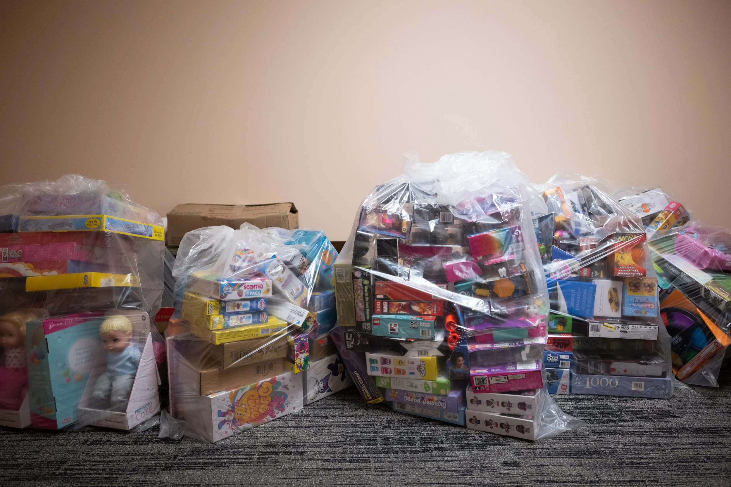 Donated toys sit in the PCHO offices on Dec. 1, 2025. The toys will later be donated to their clients with families and children in transitional housing programs.