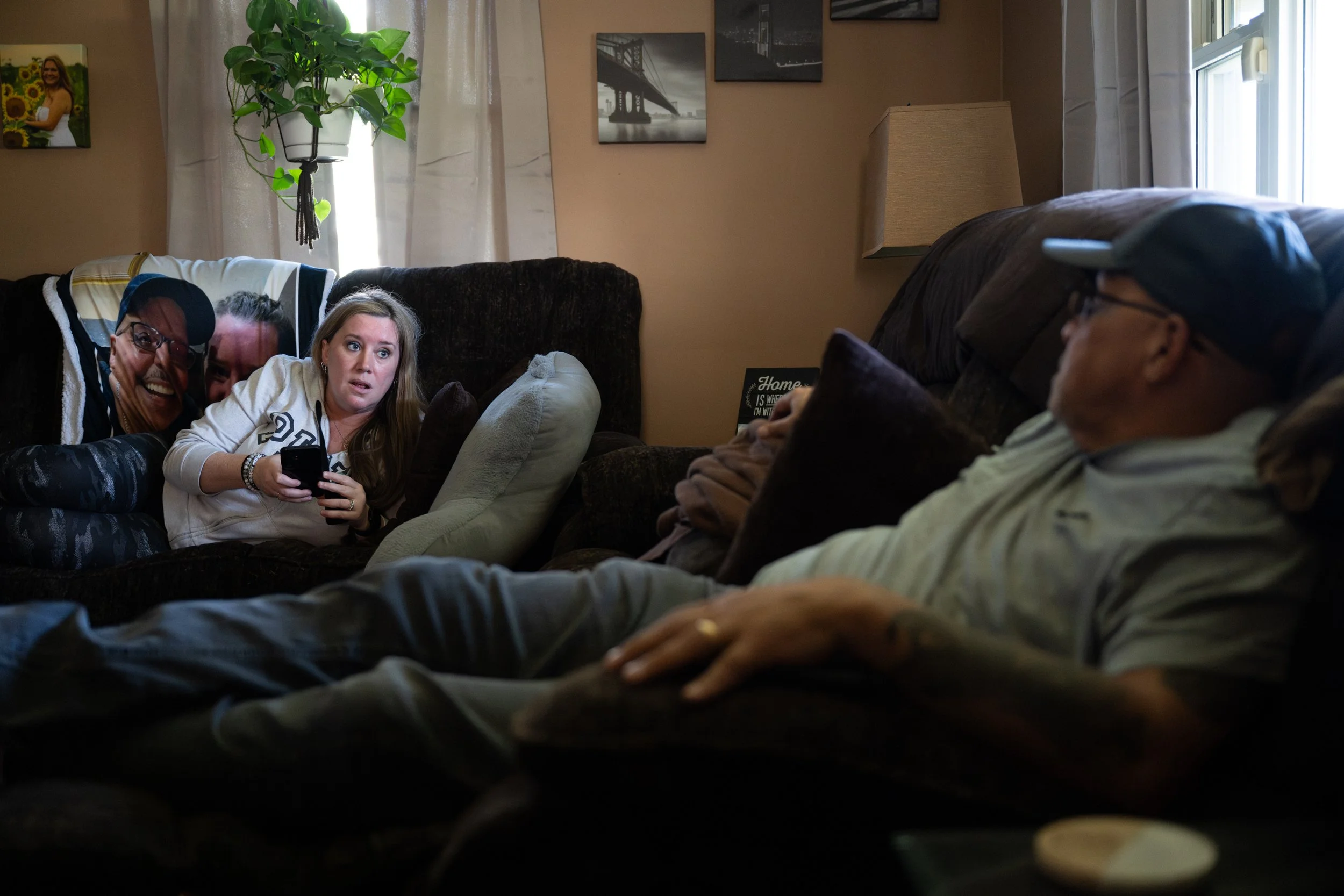 Stephen Rosa talks with his wife, Heather Rosa, in their home on April 17, 2026.