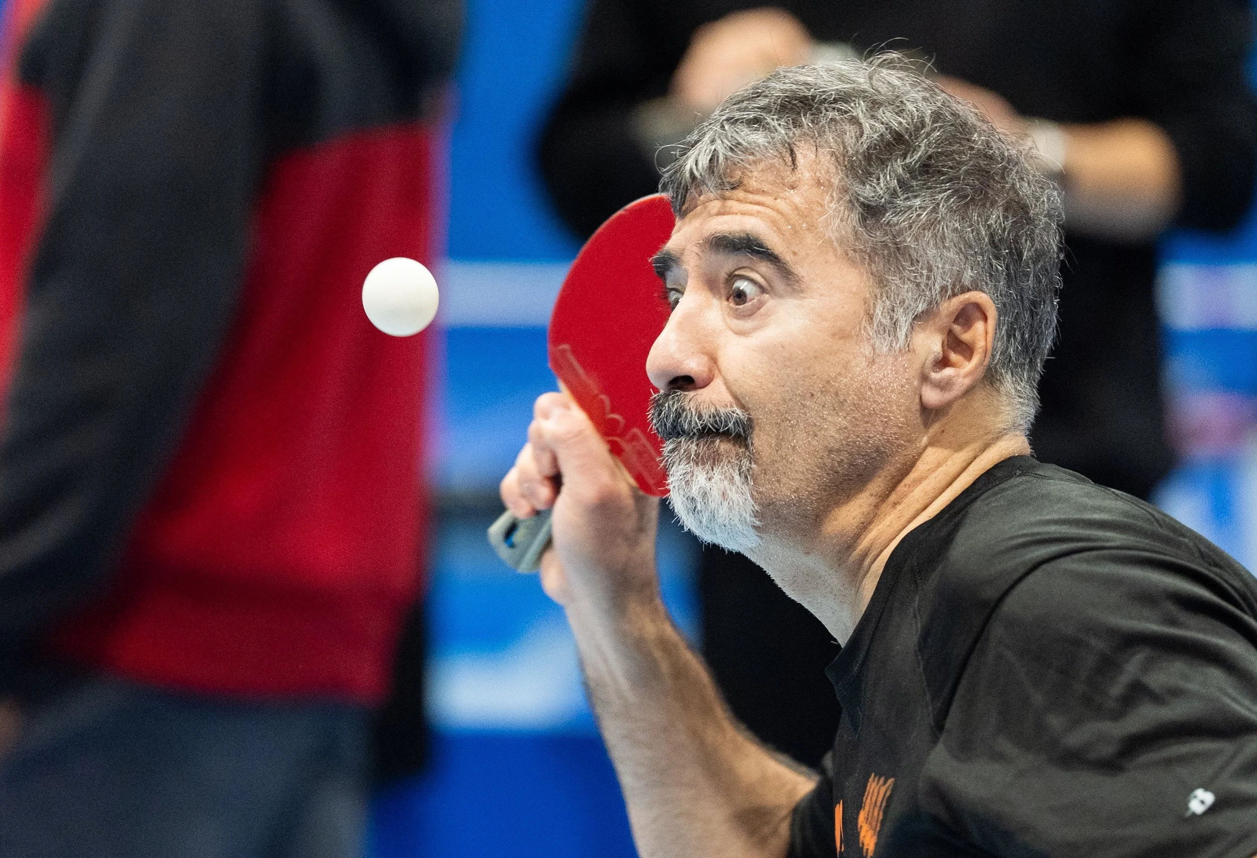 Sal Uttaro serves the ball to opponent Shah Purva during the Mike Brown Butterfly Fall Classic Tournament at the Rochester Sports Garden in Rochester, N.Y., on Nov. 9, 2025. Uttaro ultimately won the game in 4. 