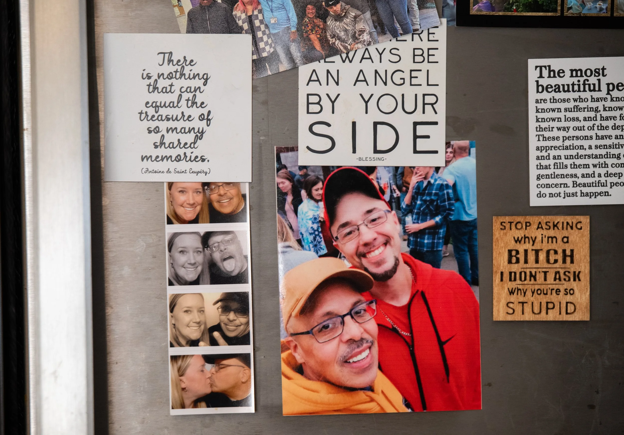 Pictures and magnets hang on the fridge of Stephen Rosa on April 17, 2026. The picture on the left is Rosa with his wife, Heather Rosa, and the picture on the right is with his oldest son Brandon Rosa.
