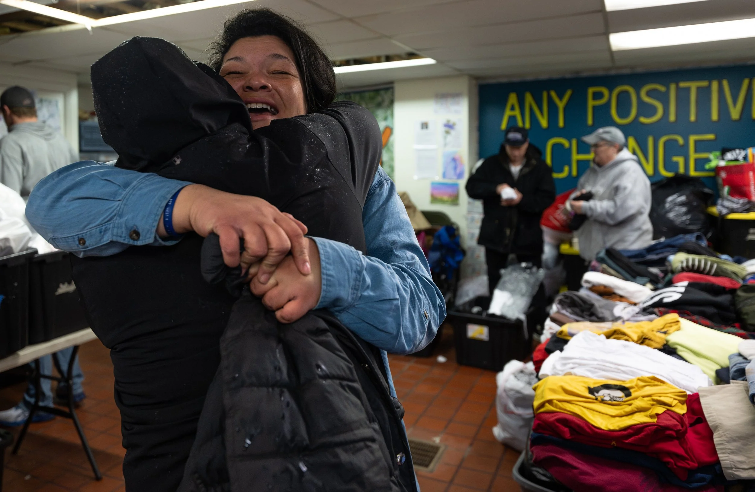 Kattie Brighou gives Stephen Rosa a hug at RAW outreach on March 22, 2026. Brighou has been volunteering at RAW since August of 2025 and claims that Rosa has "loved [her] through some hard times" and she credits him as one of the reasons she's still 
