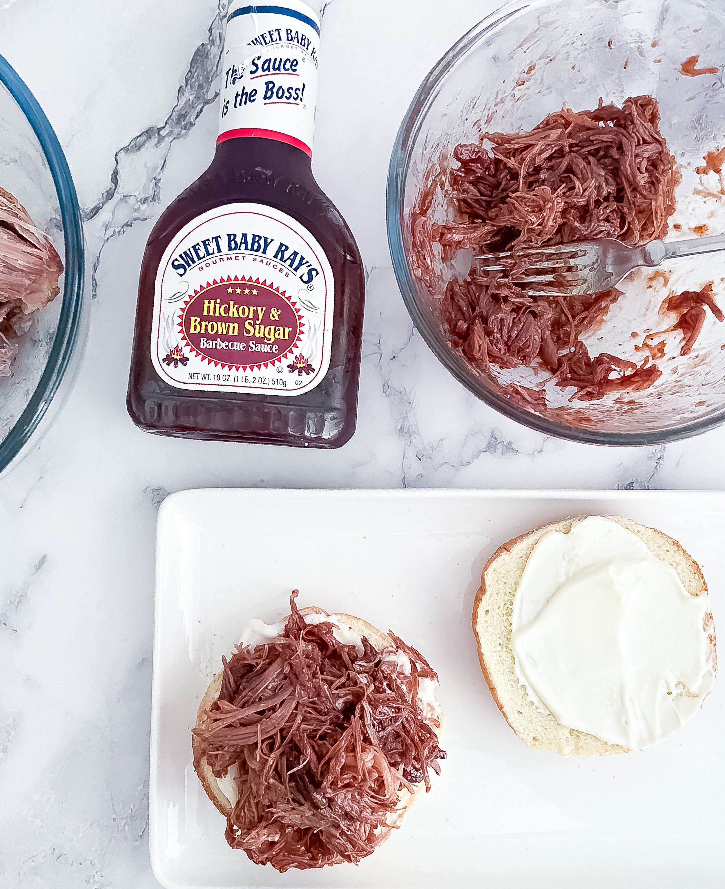 The image alt text for a crockpot BBQ pulled pork sandwich could be "Delicious crockpot BBQ pulled pork sandwich piled high on a bun, topped with tangy coleslaw."