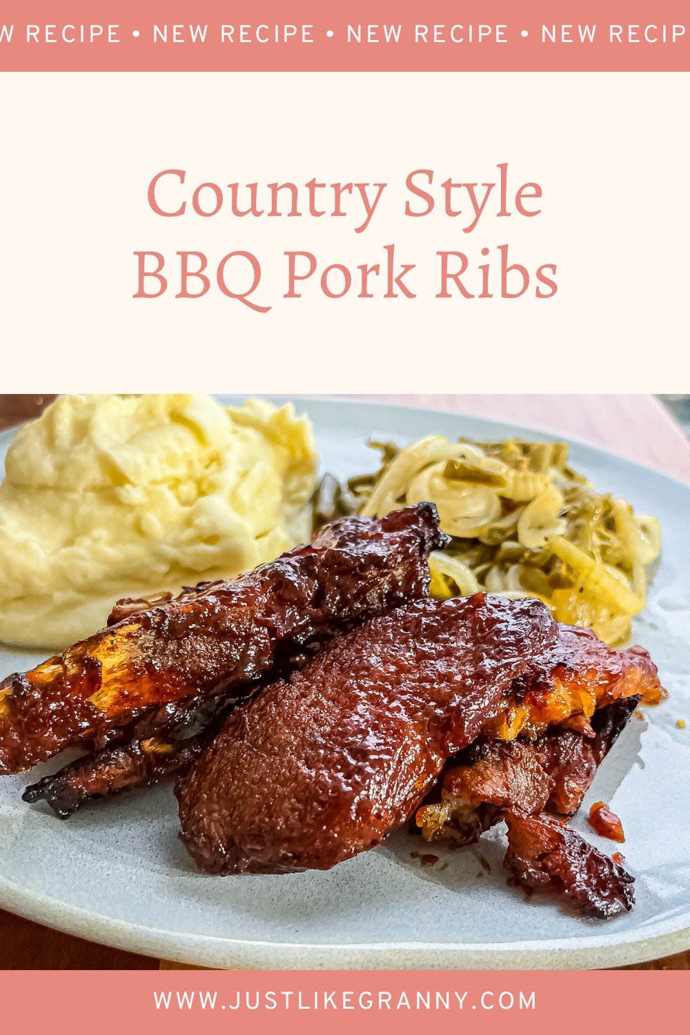 Fall-Off-The-Bone Country Style BBQ Ribs on a white plate with a side of coleslaw and corn on the cob. The ribs are coated in a thick, delicious BBQ sauce and cooked to perfection.