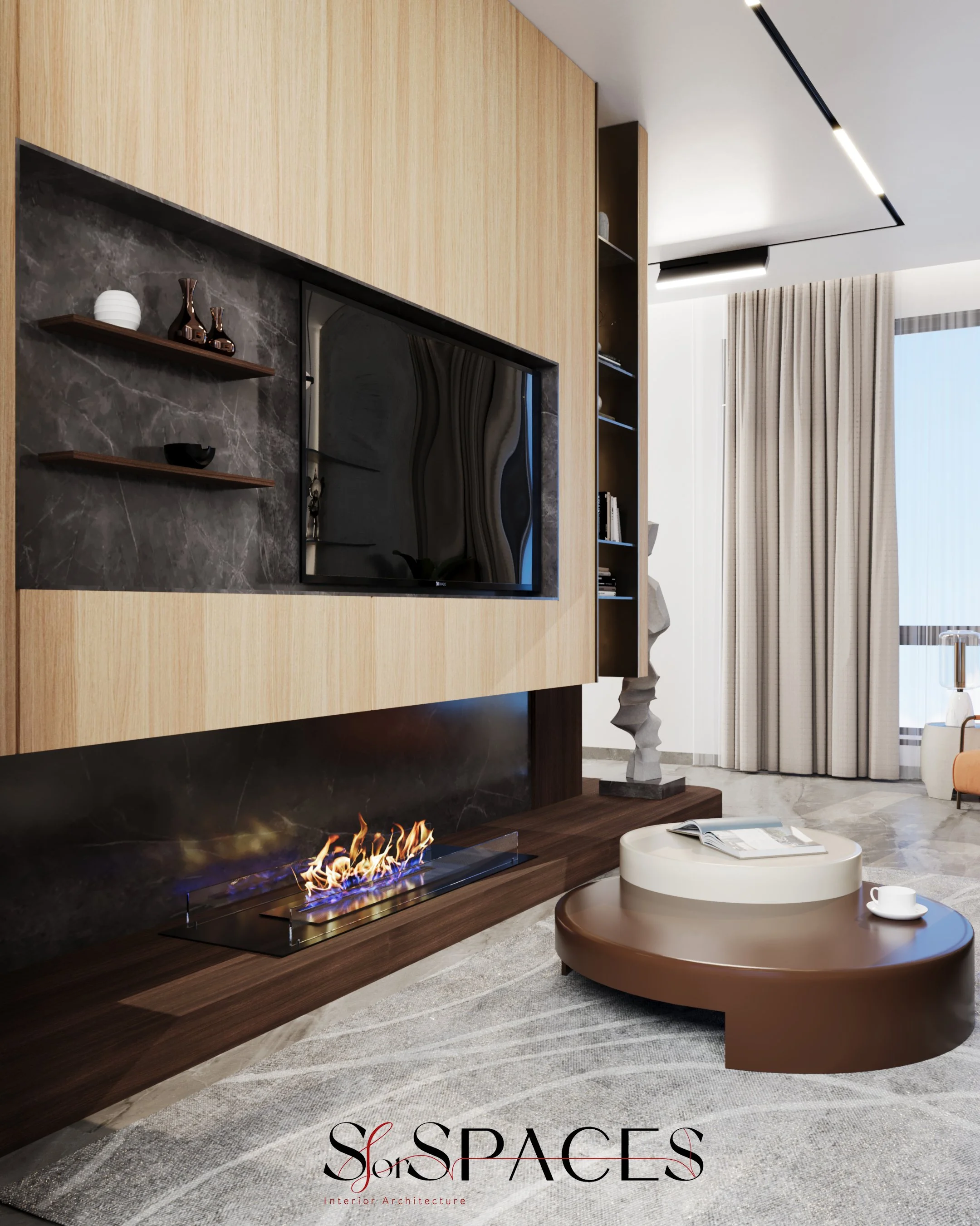 The built-in TV unit seamlessly integrates into the curved architectural feature, creating a striking focal point.