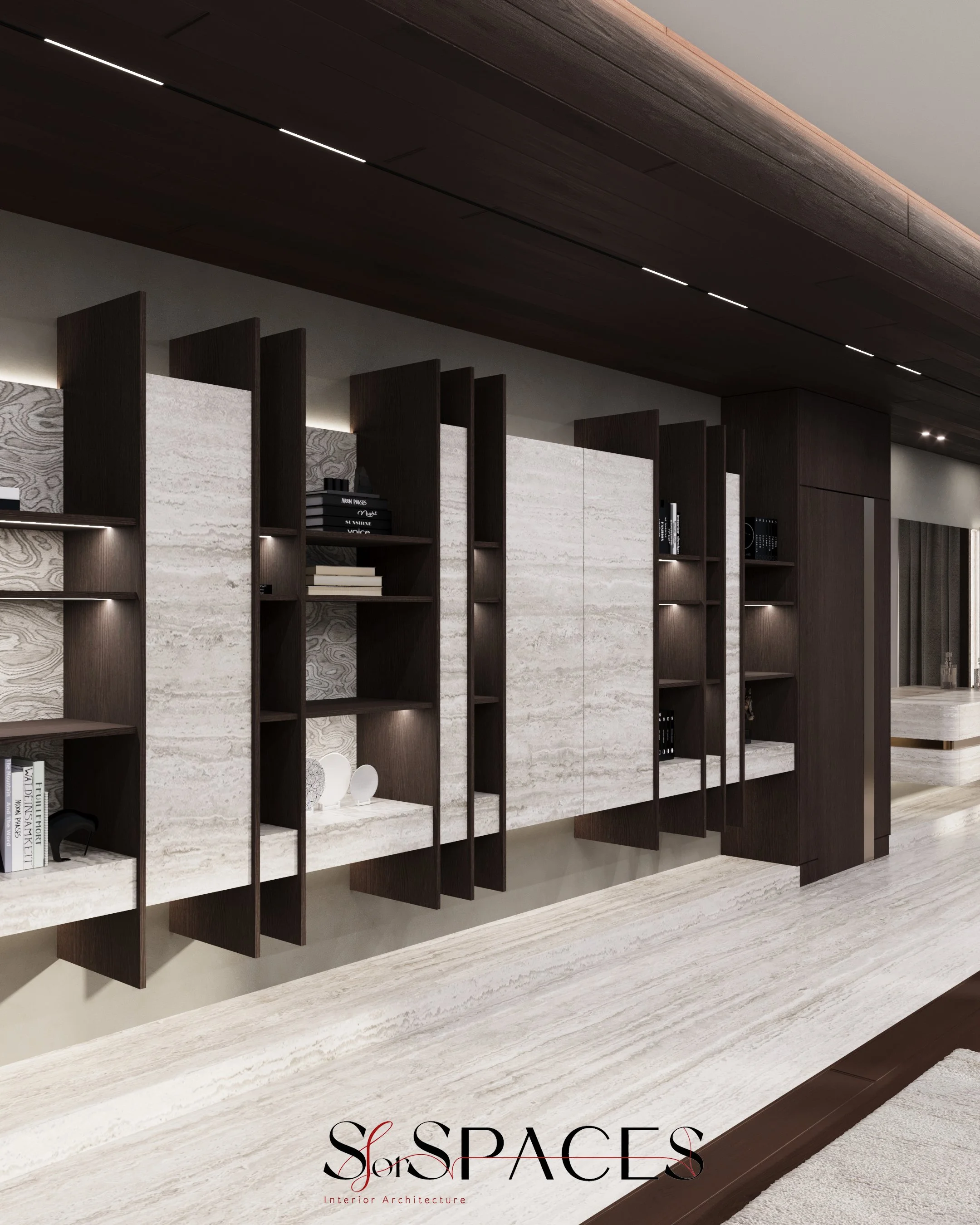 The vertical shelving wall running along the corridor serves multiple purposes beyond storage;  it introduces rhythm and depth along what would otherwise be a transitional space.