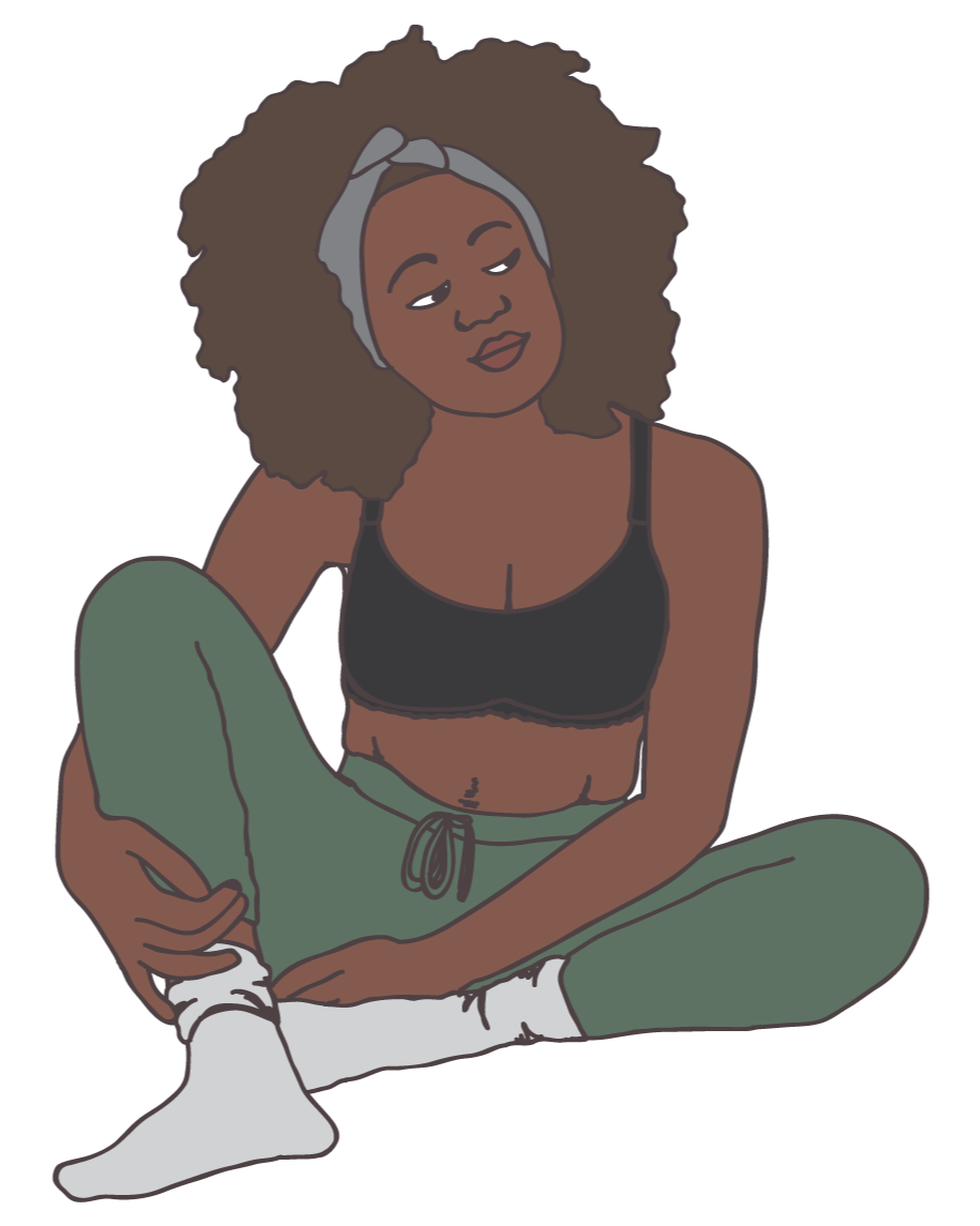 A black person with long curly hair in a headband sits and looks pensively to their left.