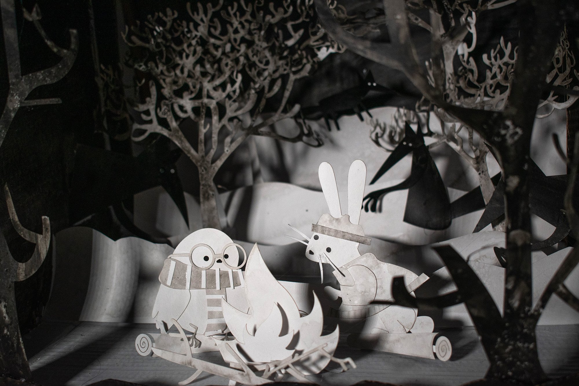 Campfire: Warm and cozy model made from cut paper, ink, and lighting!