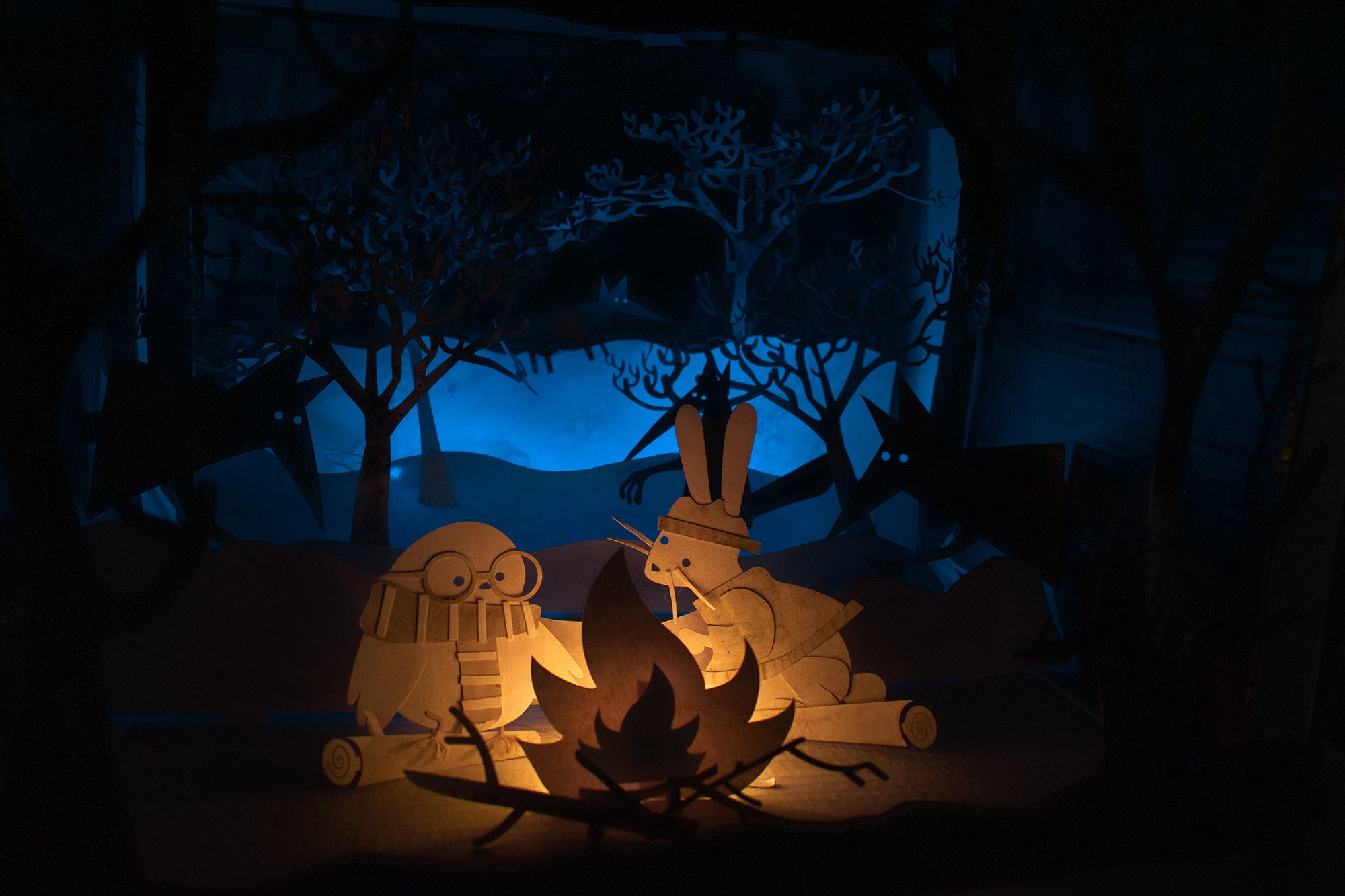 Campfire: Warm and cozy model made from cut paper, ink, and lighting!