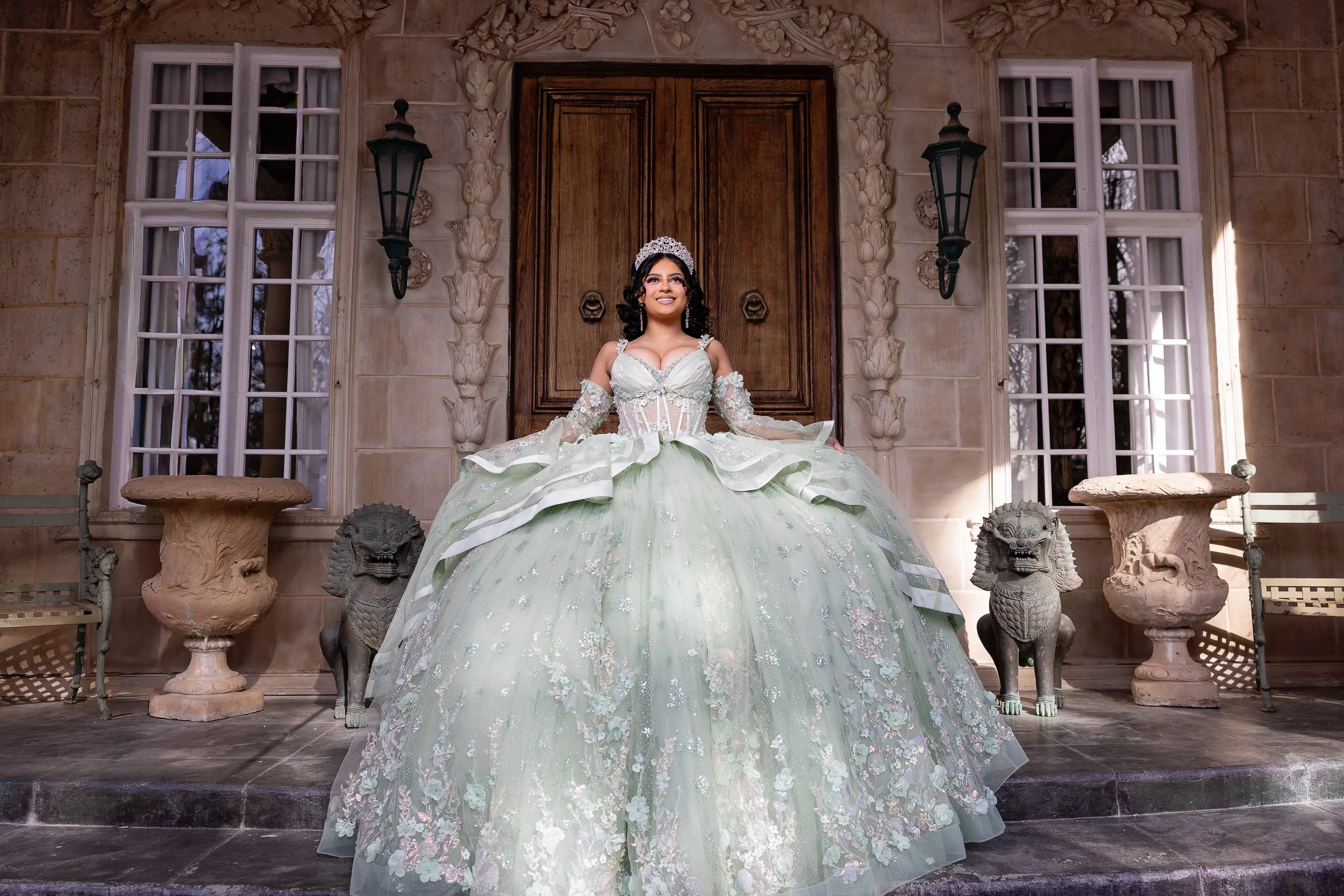 Golden sunset reflecting off the La Caille conservatory creates a dramatic and romantic setting for this quinceañera portrait. The glass greenhouse and mountain backdrop make this one of Utah’s most unique locations for quinceañera photography.