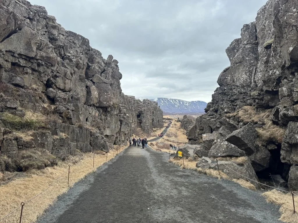 The long path and black rocks of the Þingvellir (Thingvellir) National Park