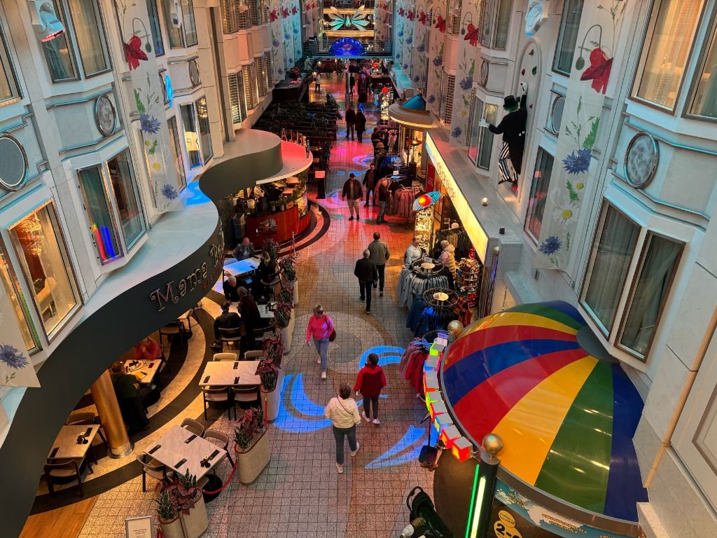The colourful shops and busy designs of the MS Color Fantasy promenade.