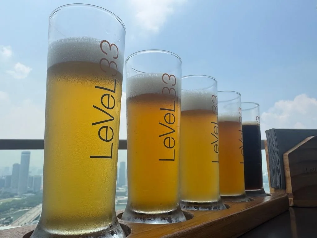The LeVel33 tasting paddle of beer overlooking Marina Bay in Singapore.
