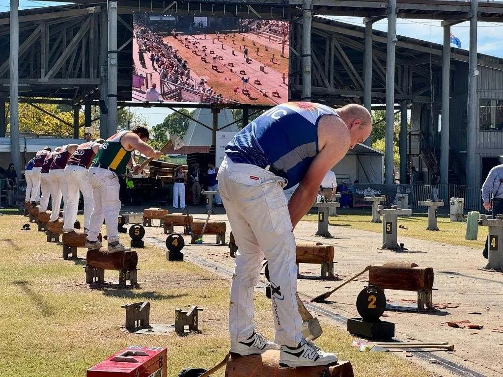 A line of woodchoppers preparing to compete at the Sydney Royal Easter Show in 2025.