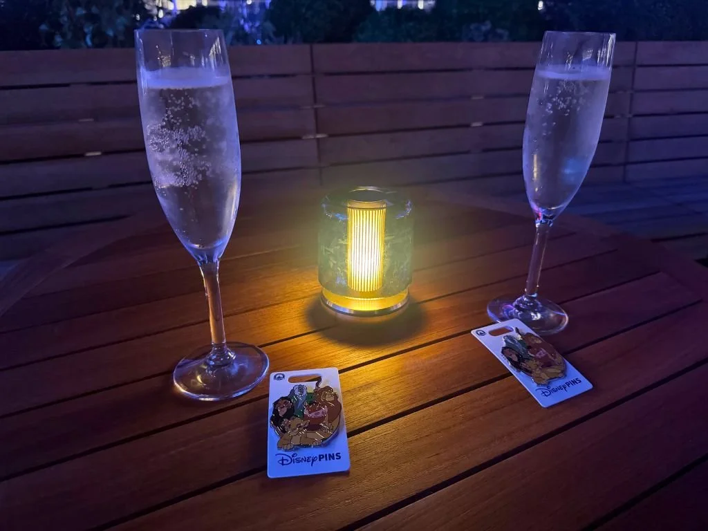 Champagne and included Lion King pins as part of the exclusive fireworks package on Disney Adventure
