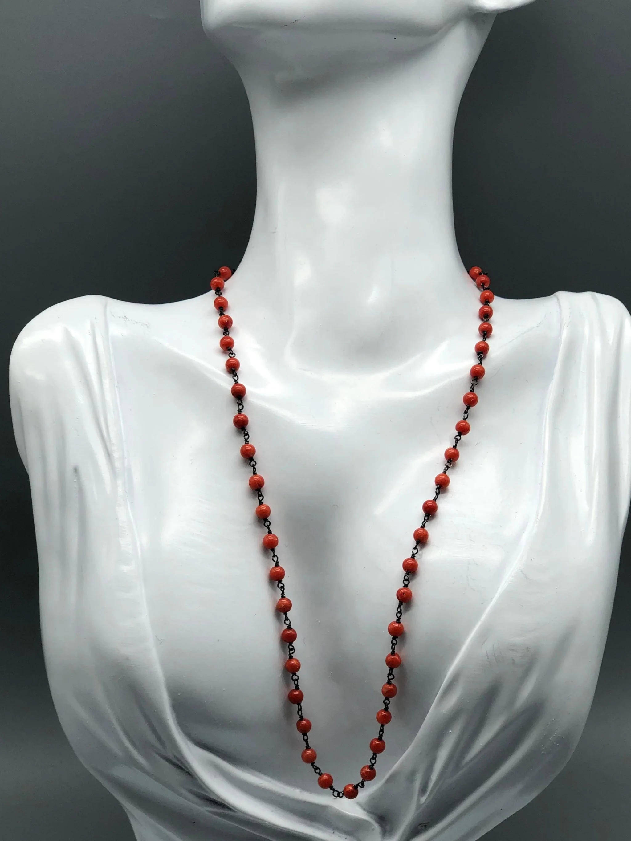 coral rosary necklace in oxidized sterling silver by Crepundia Gioielli.