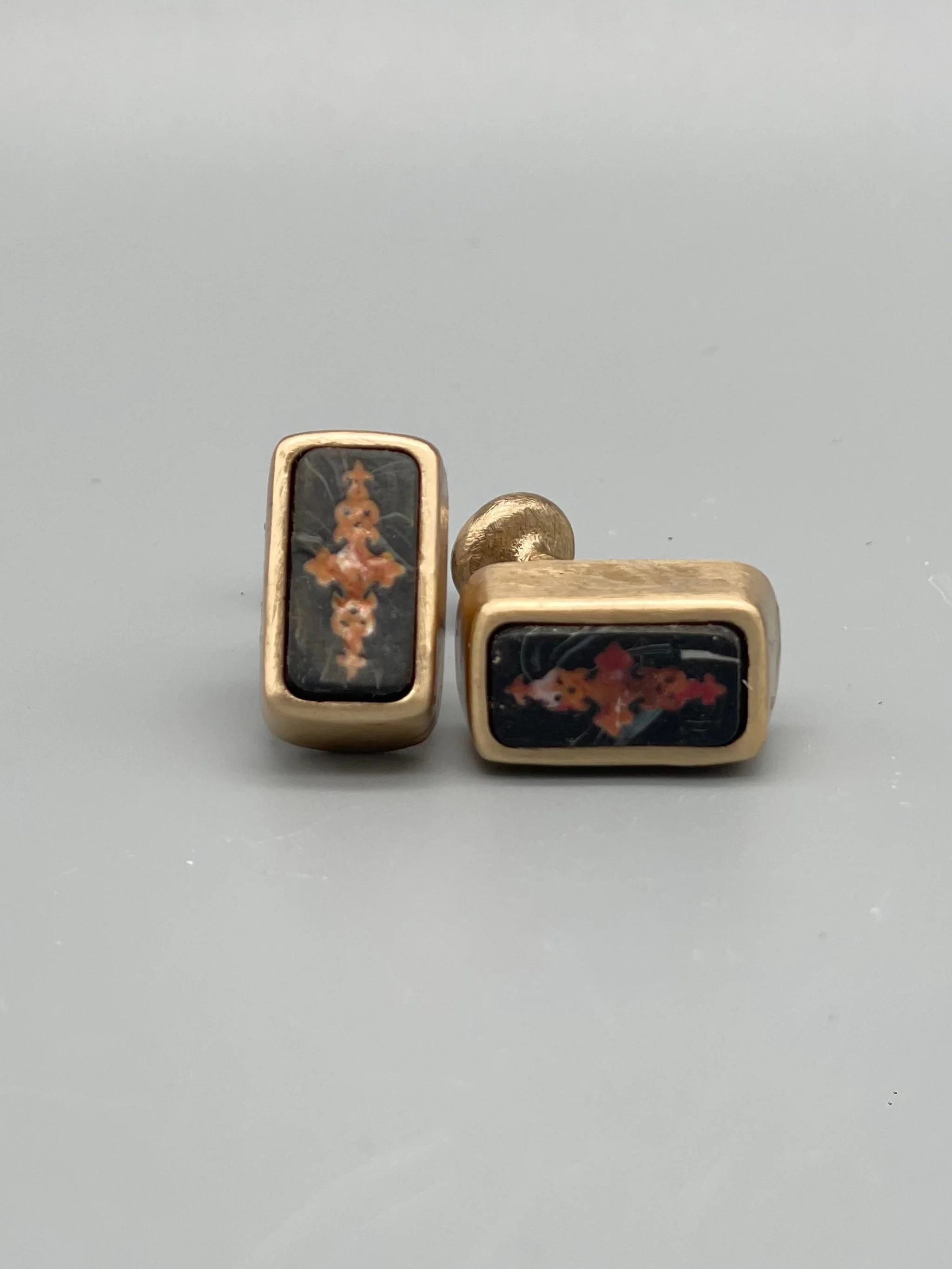 CōDICEDS cufflinks in bronze with polymer clay and Omonoia element, Crepundia Gioielli Bologna